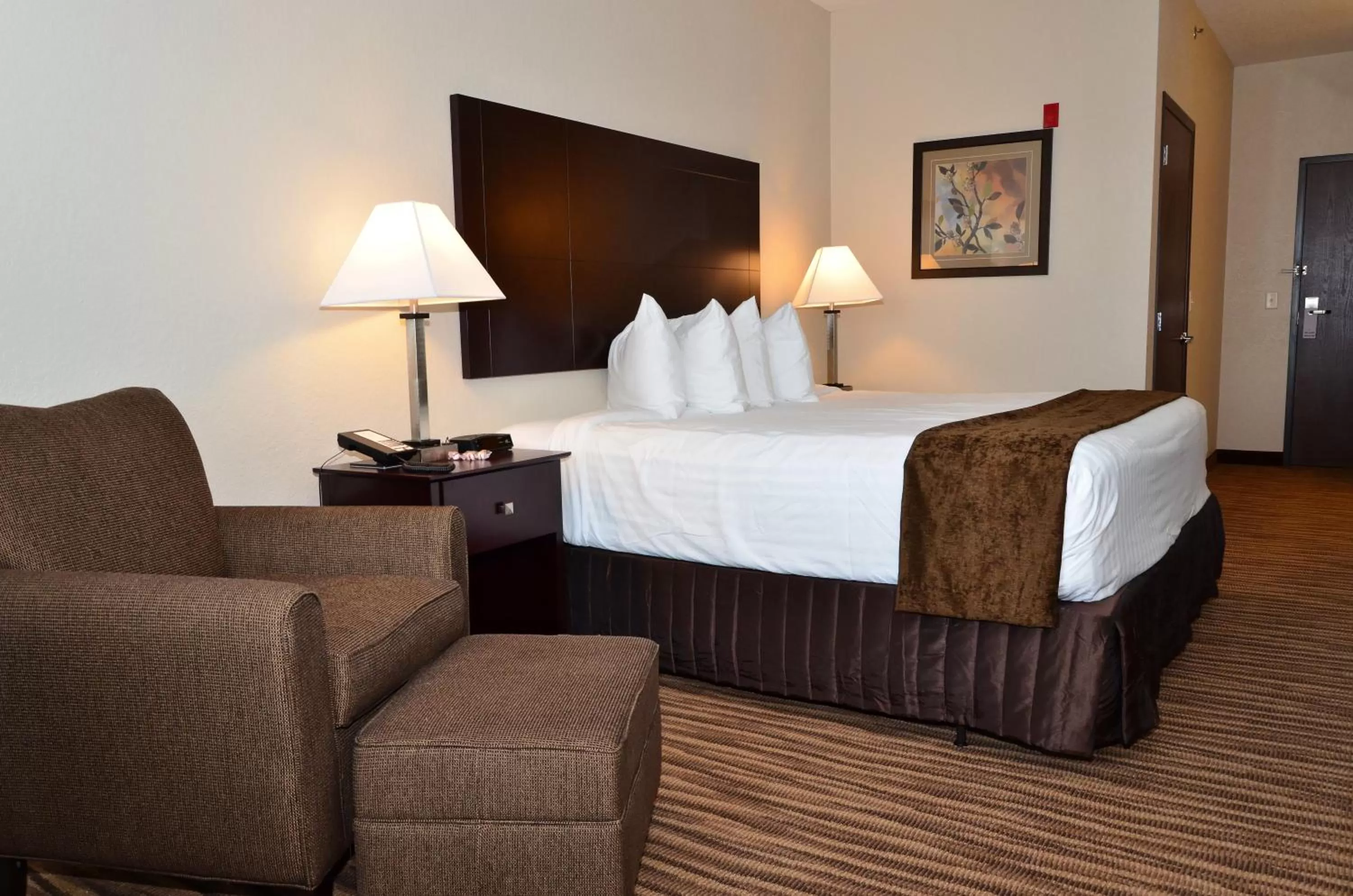 Bed in Cobblestone Inn & Suites - Clarion
