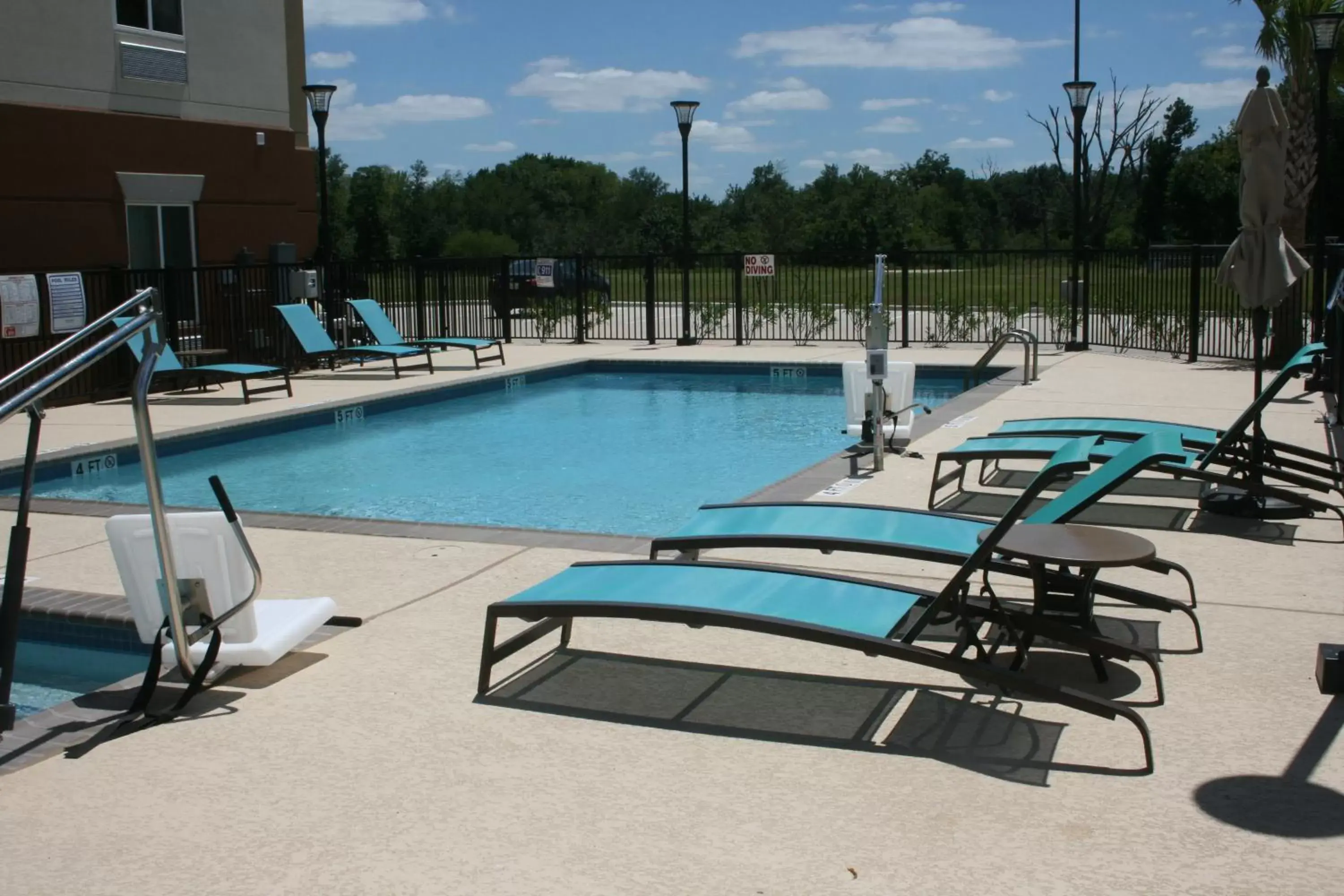 Swimming Pool in Candlewood Suites College Station, an IHG Hotel