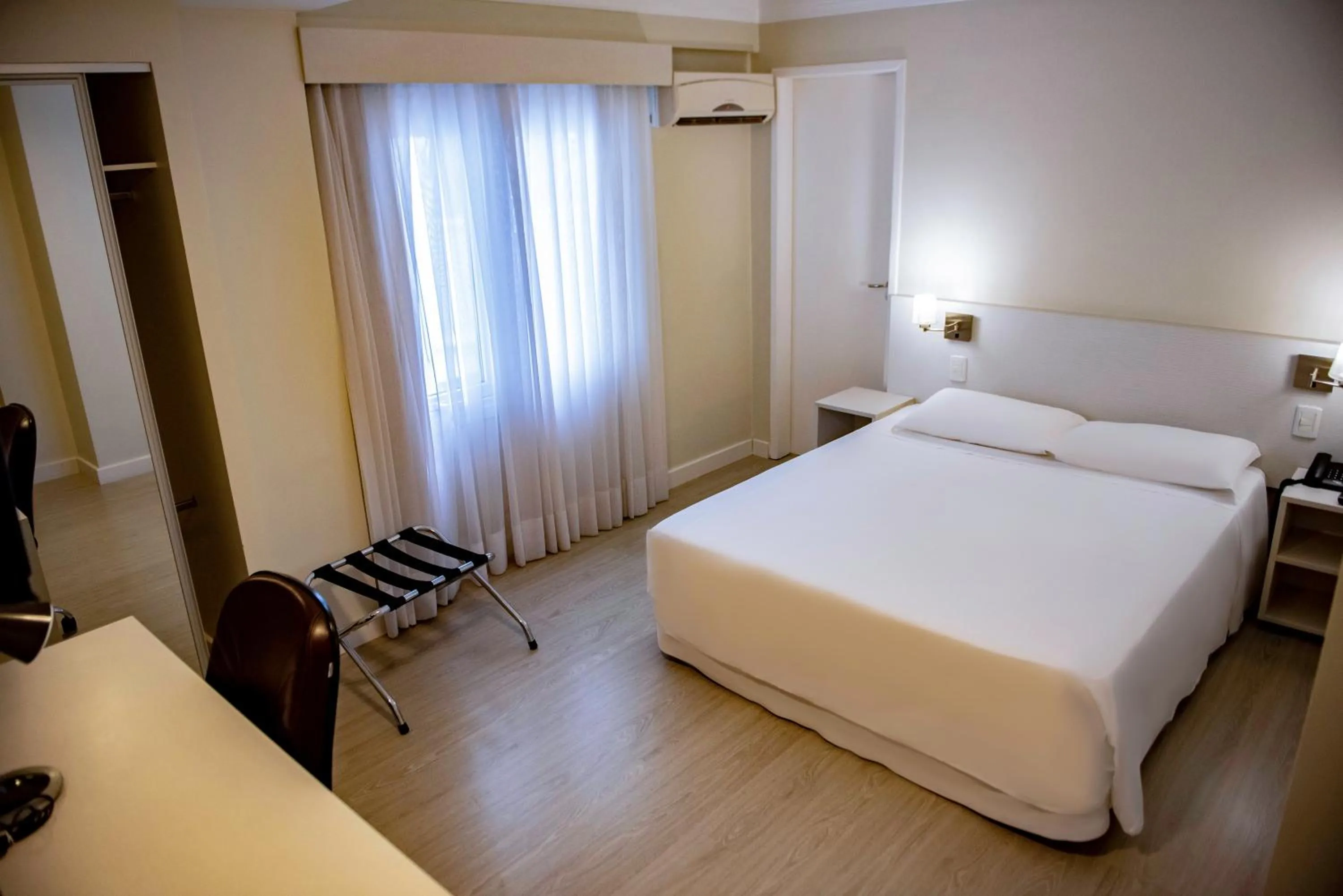 Photo of the whole room, Bed in Charrua Hotel