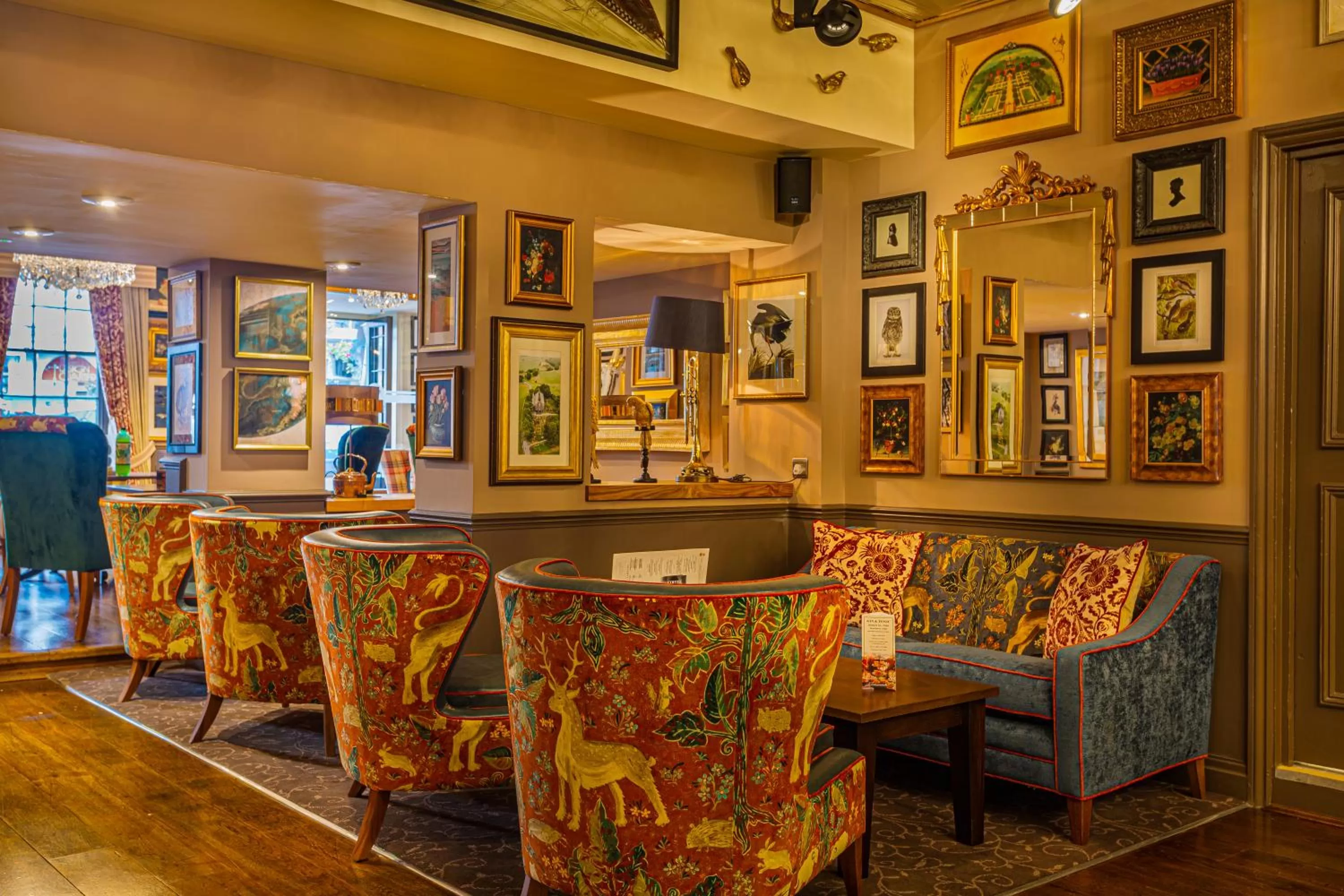 Communal lounge/ TV room in The Feathers Hotel, Ledbury - The Coaching Inn Group