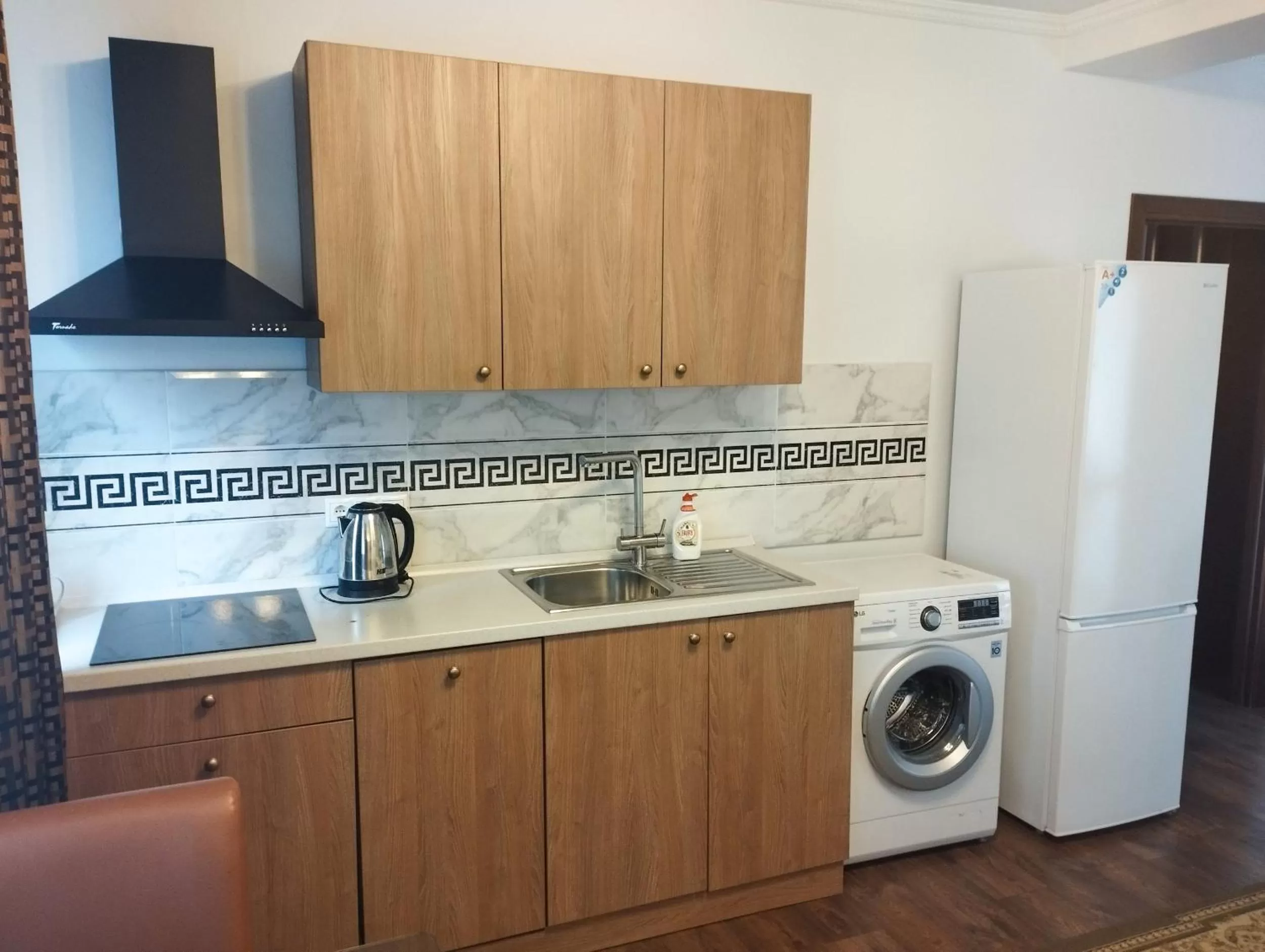 Kitchen or kitchenette in Klassik Hotel