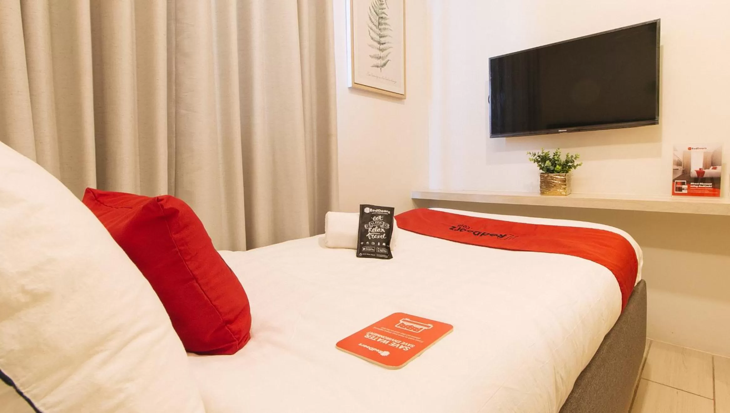 Photo of the whole room, Bed in RedDoorz Plus at La Belle Residences Makati City