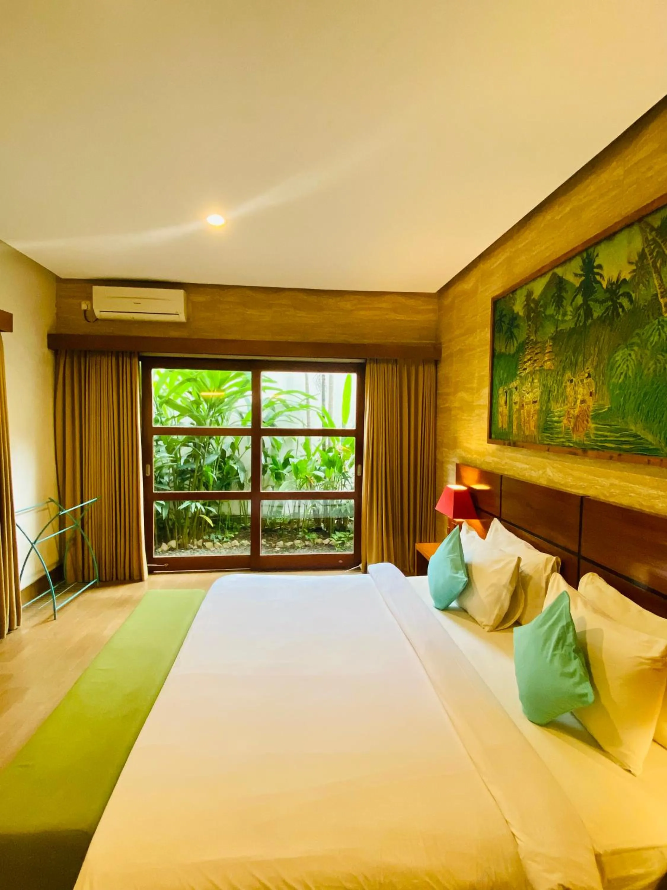 Bed in The Green Zhurga Suite Seminyak