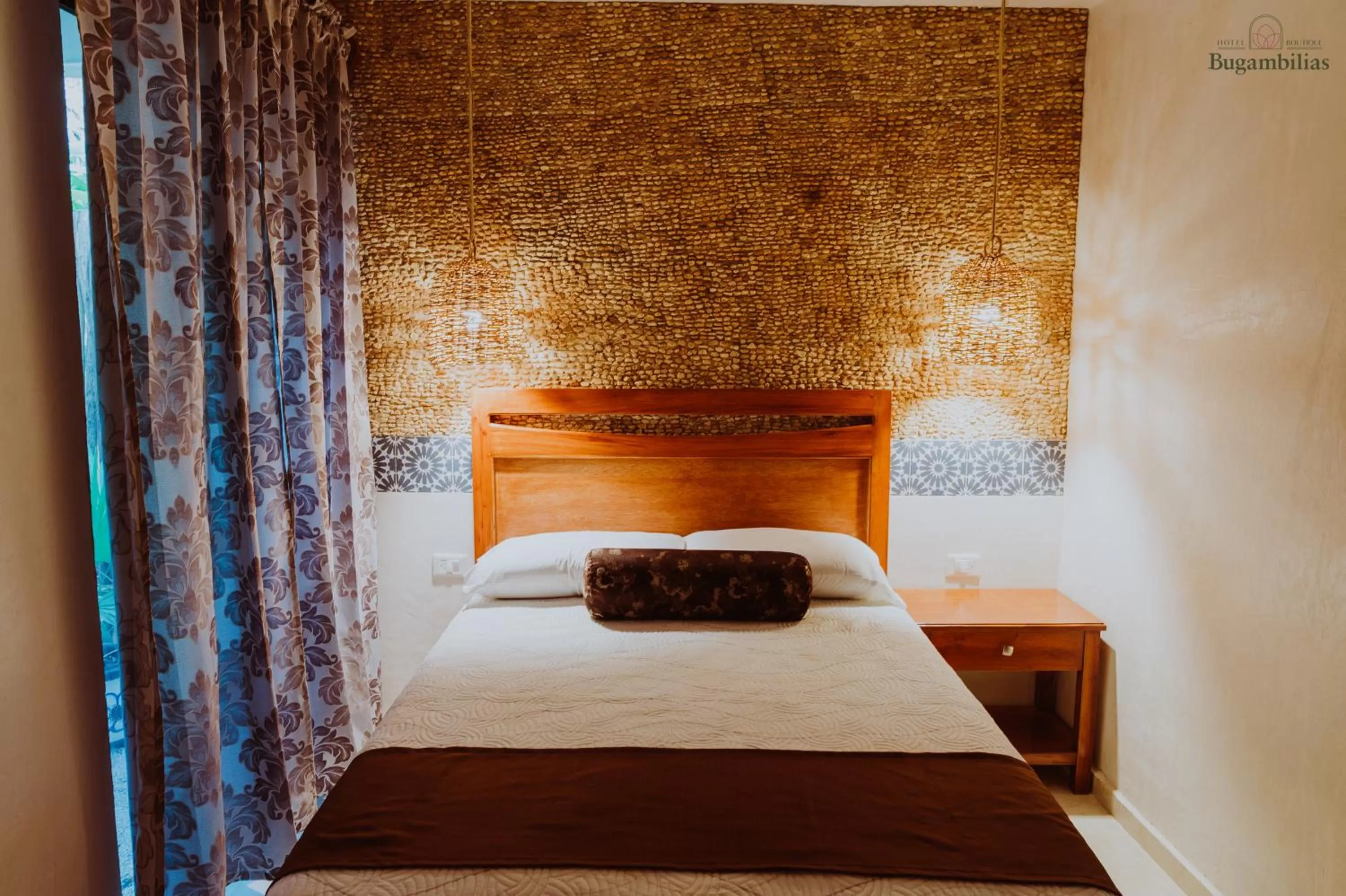 Bed in Hotel Boutique Bugambilias