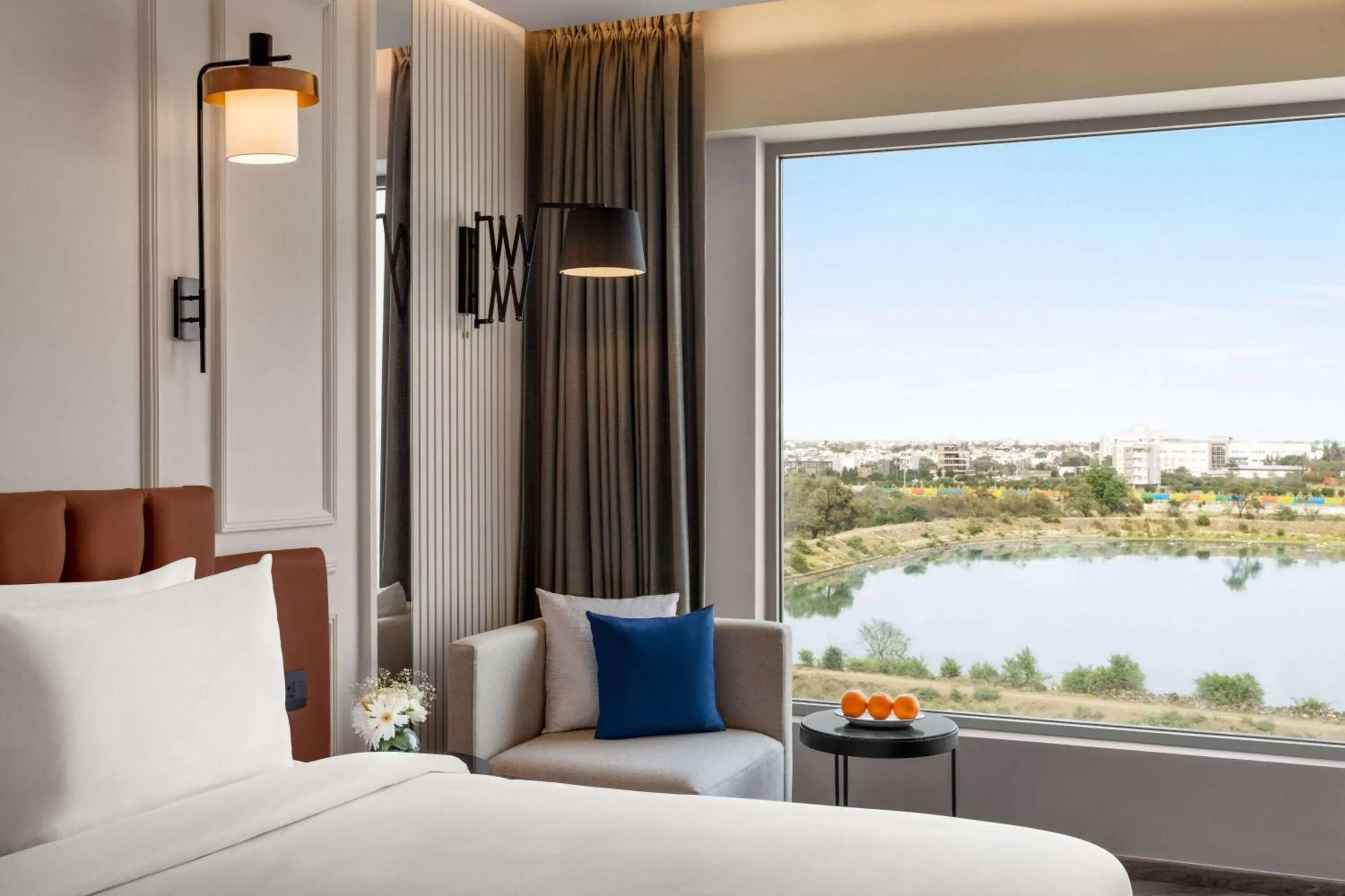 Photo of the whole room, Bed in Ramada Encore by Wyndham Indore Nipania Photo of the whole room, Bed in Ramada Encore by Wyndham Indore Nipania