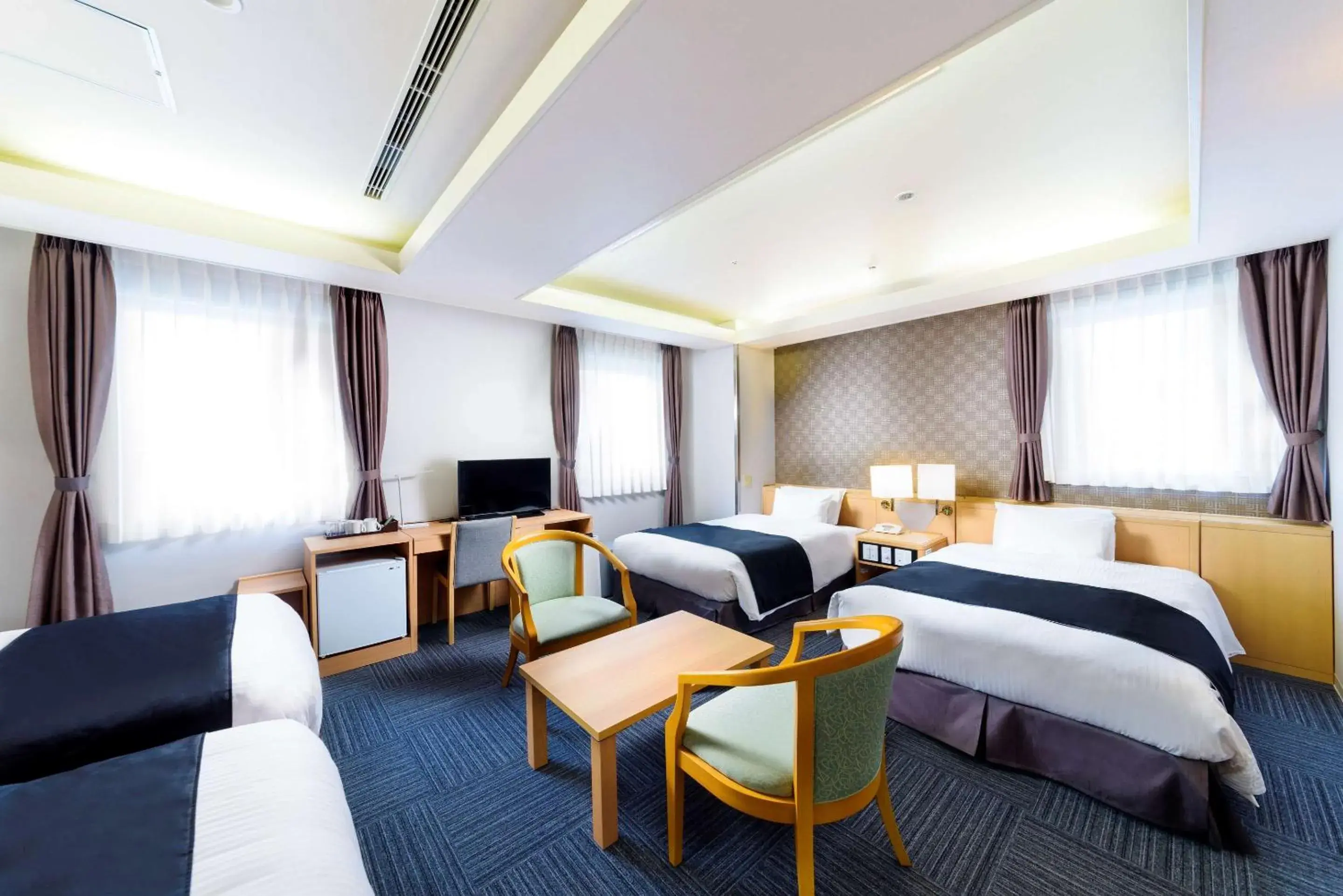 Bedroom, Seating Area in SureStay Plus Hotel by Best Western Shin-Osaka