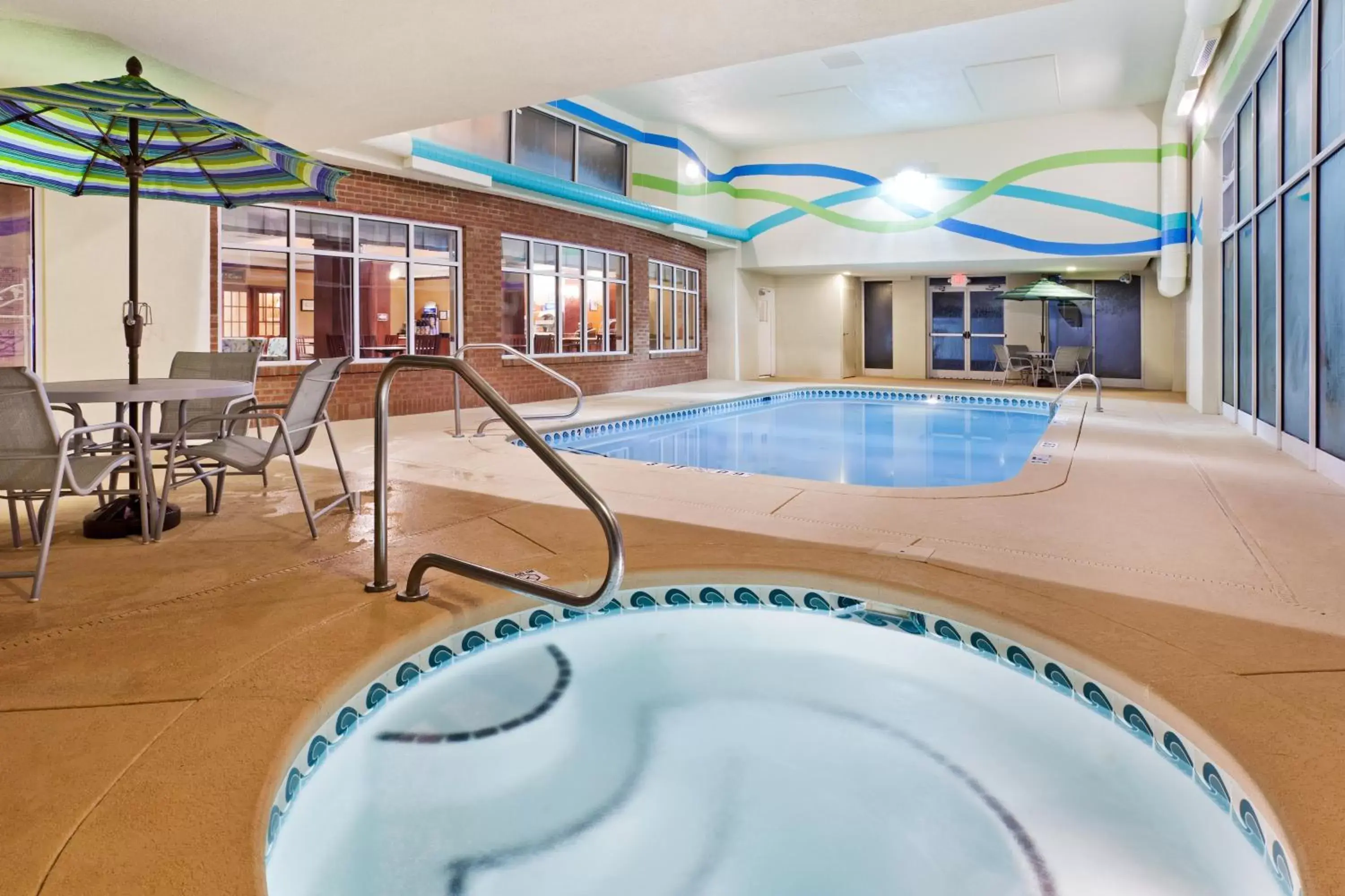 Swimming Pool in Holiday Inn Express & Suites Sylva / Dillsboro, an IHG Hotel