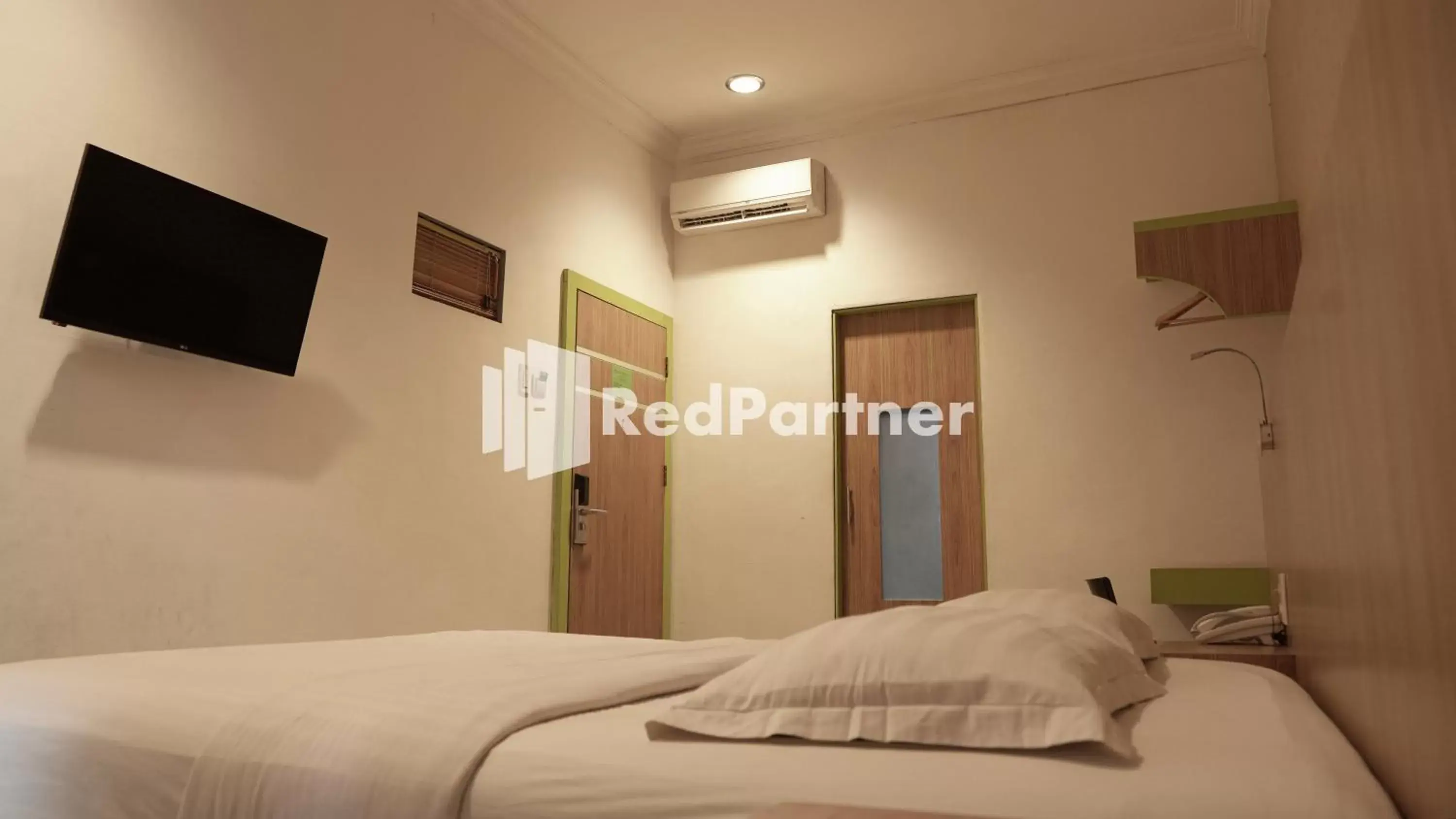 Bedroom, Bed in Wisma Sederhana RedPartner