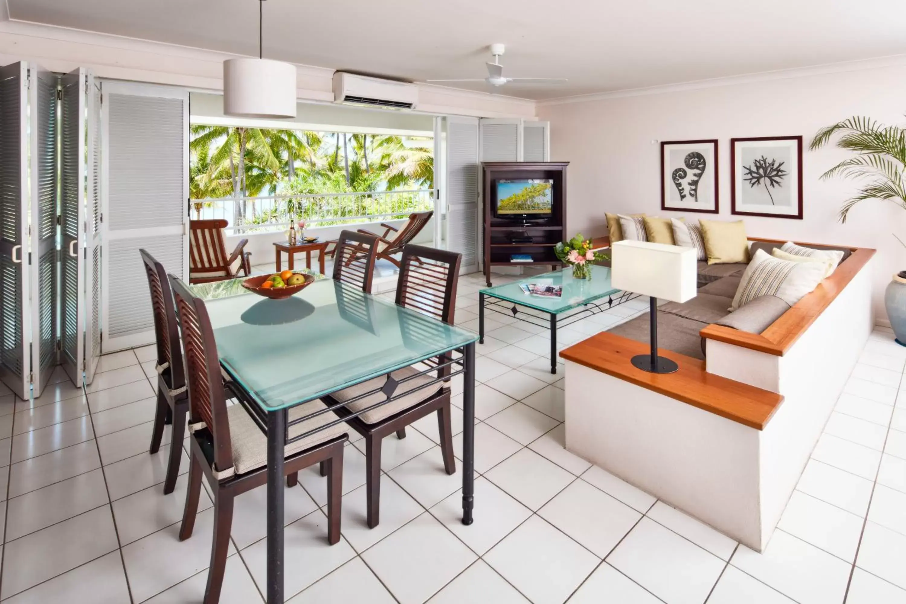 Living room in Alamanda Palm Cove by Lancemore