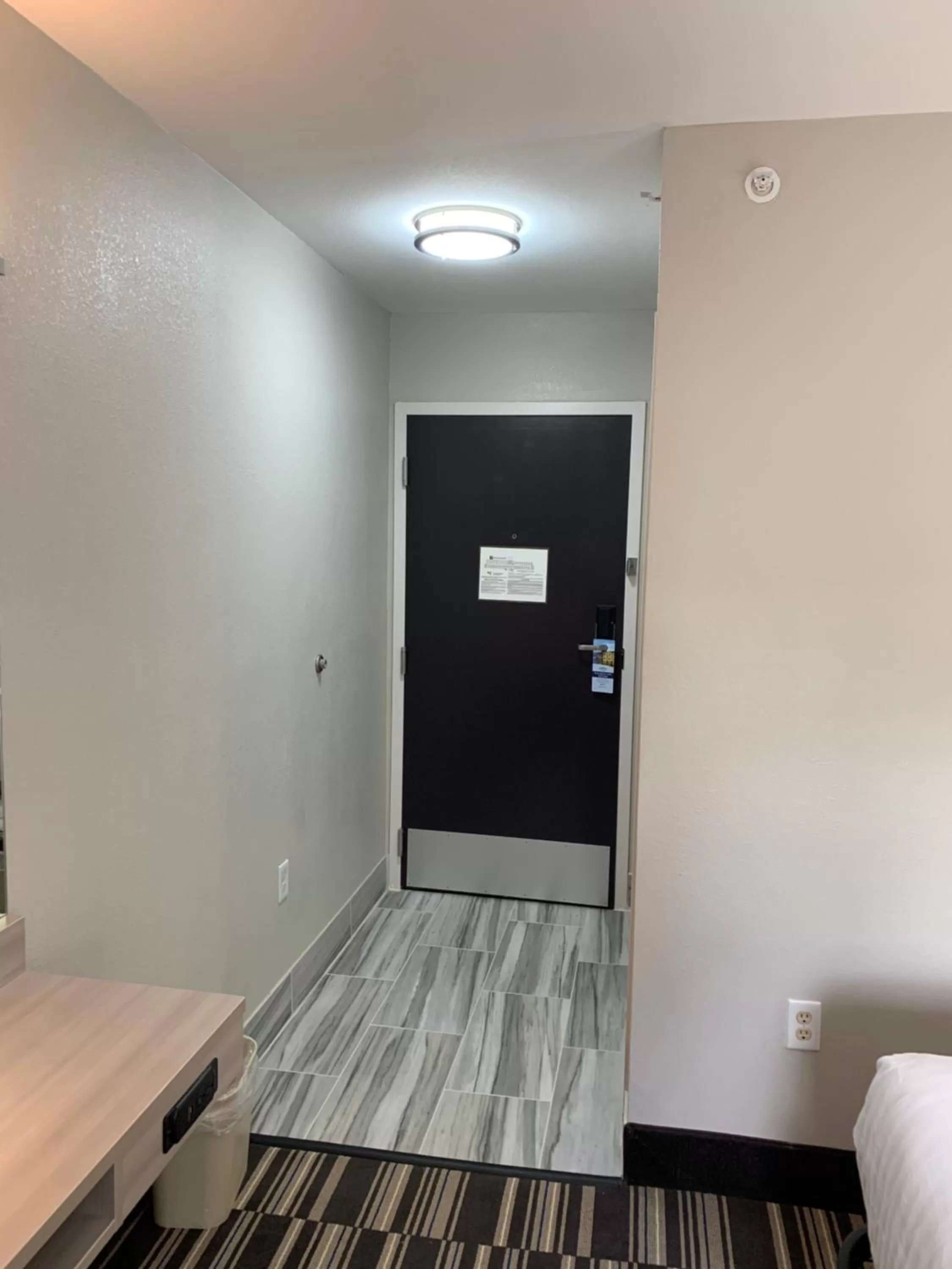 Bed in Microtel Inn by Wyndham Charlotte Airport