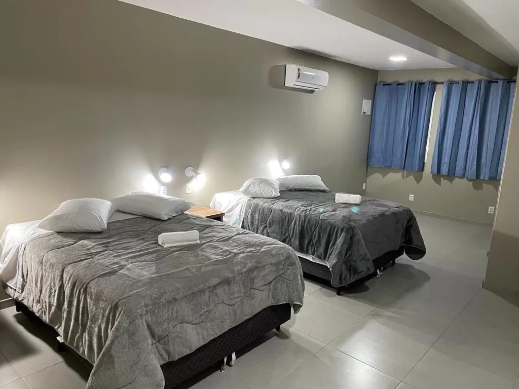 Bed in Hotel Executivo