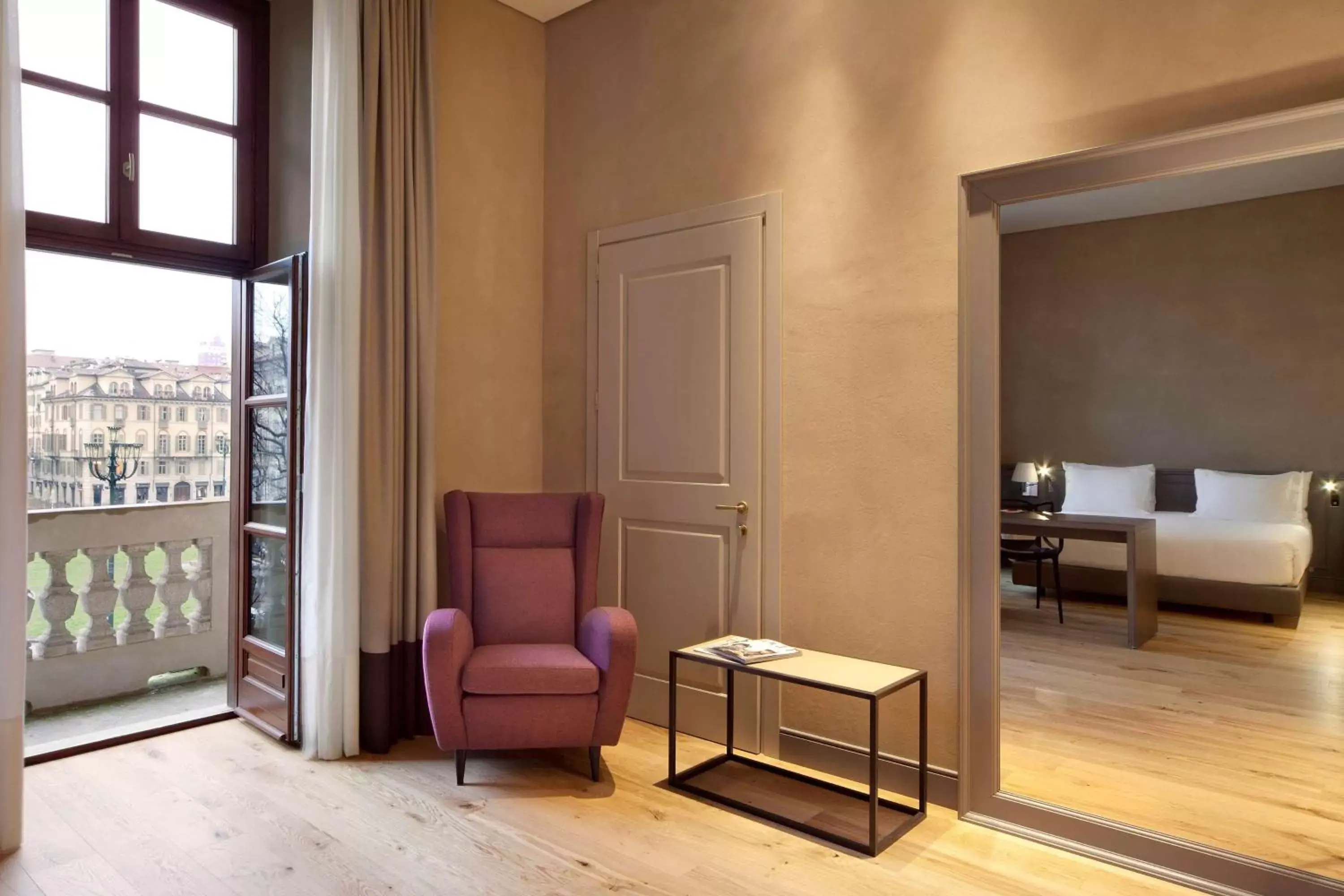 Photo of the whole room, Seating Area in NH Collection Torino Piazza Carlina