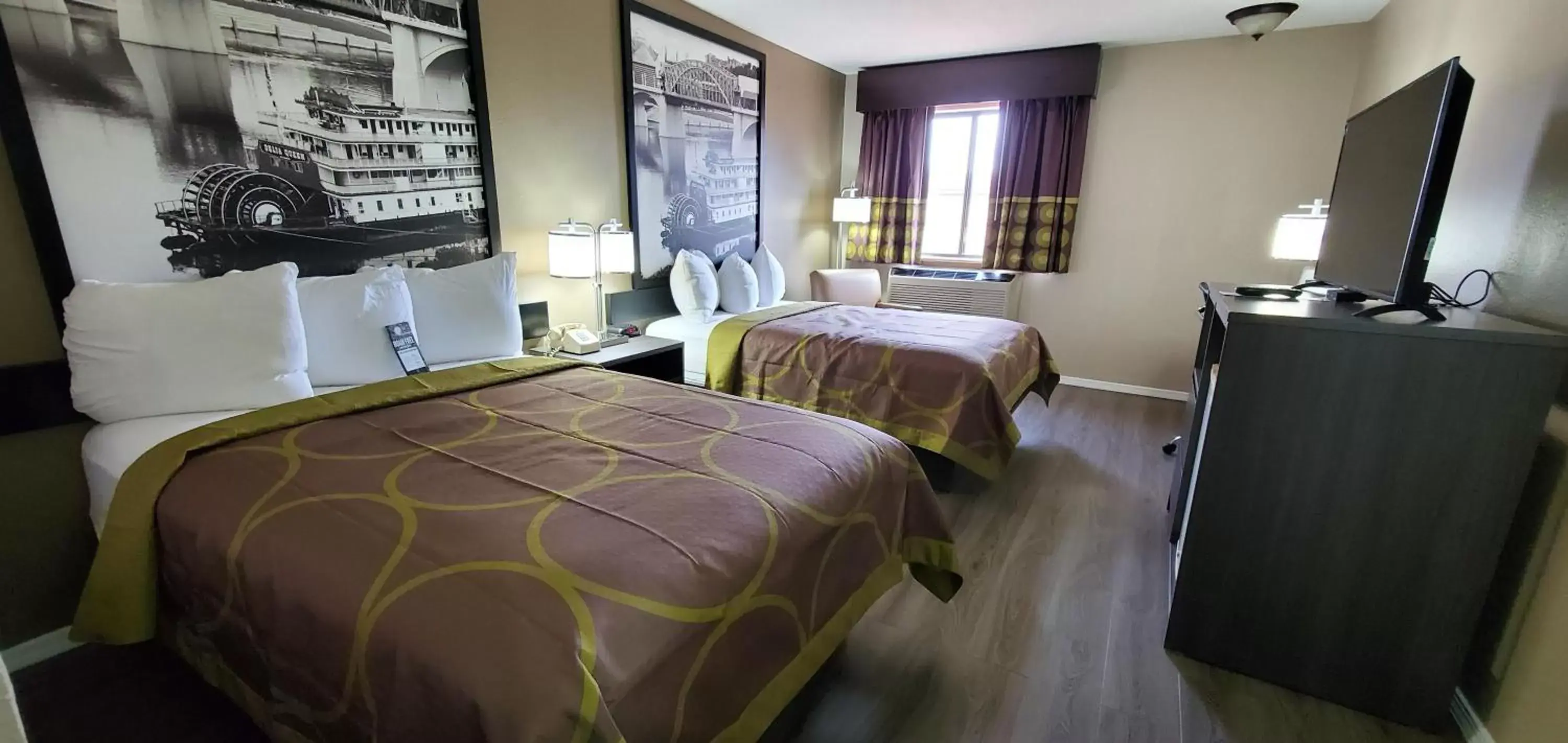 Photo of the whole room, Bed in Super 8 by Wyndham Paris