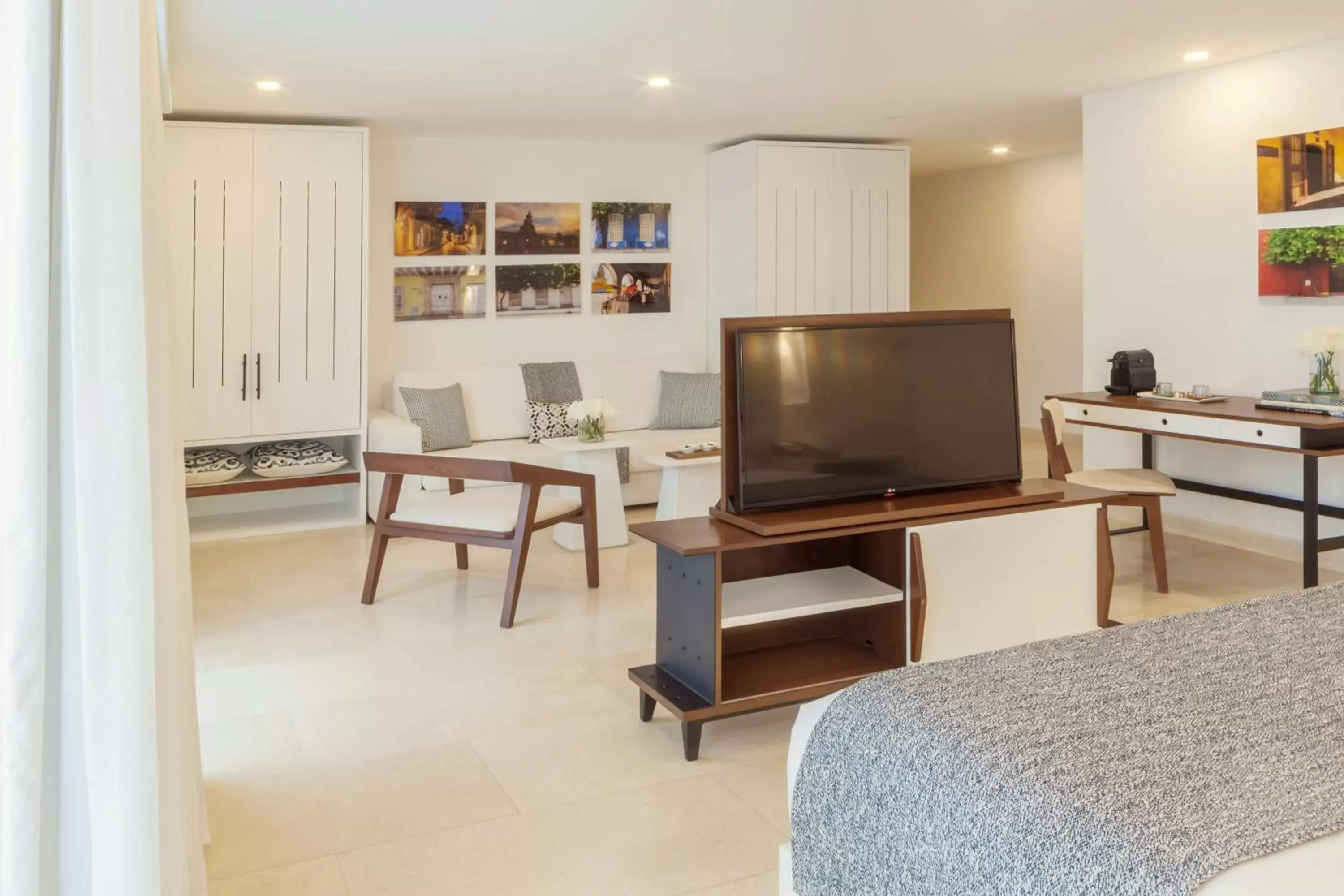 Living room, TV/Entertainment Center in Nacar Hotel Cartagena, Curio Collection by Hilton