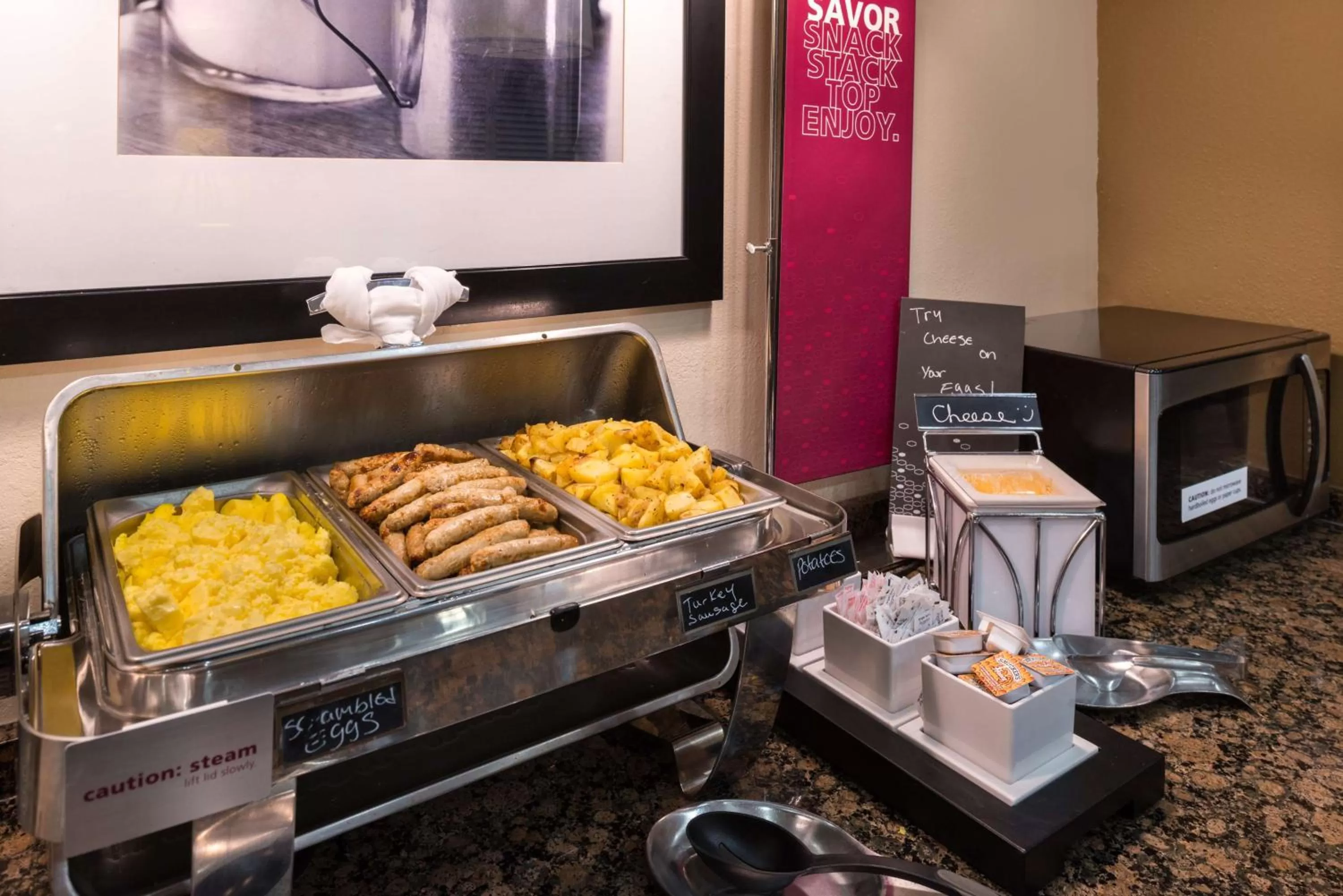 Dining area in Hampton Inn & Suites Orlando-East UCF