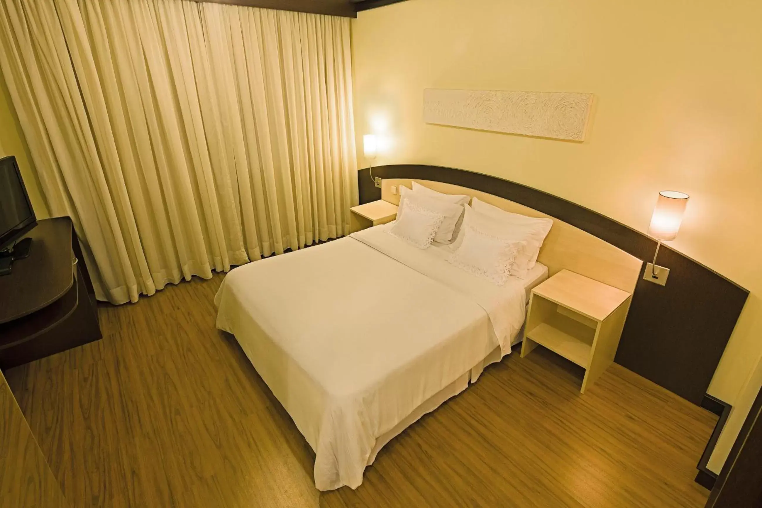 Photo of the whole room, Bed in Swan Caxias do Sul