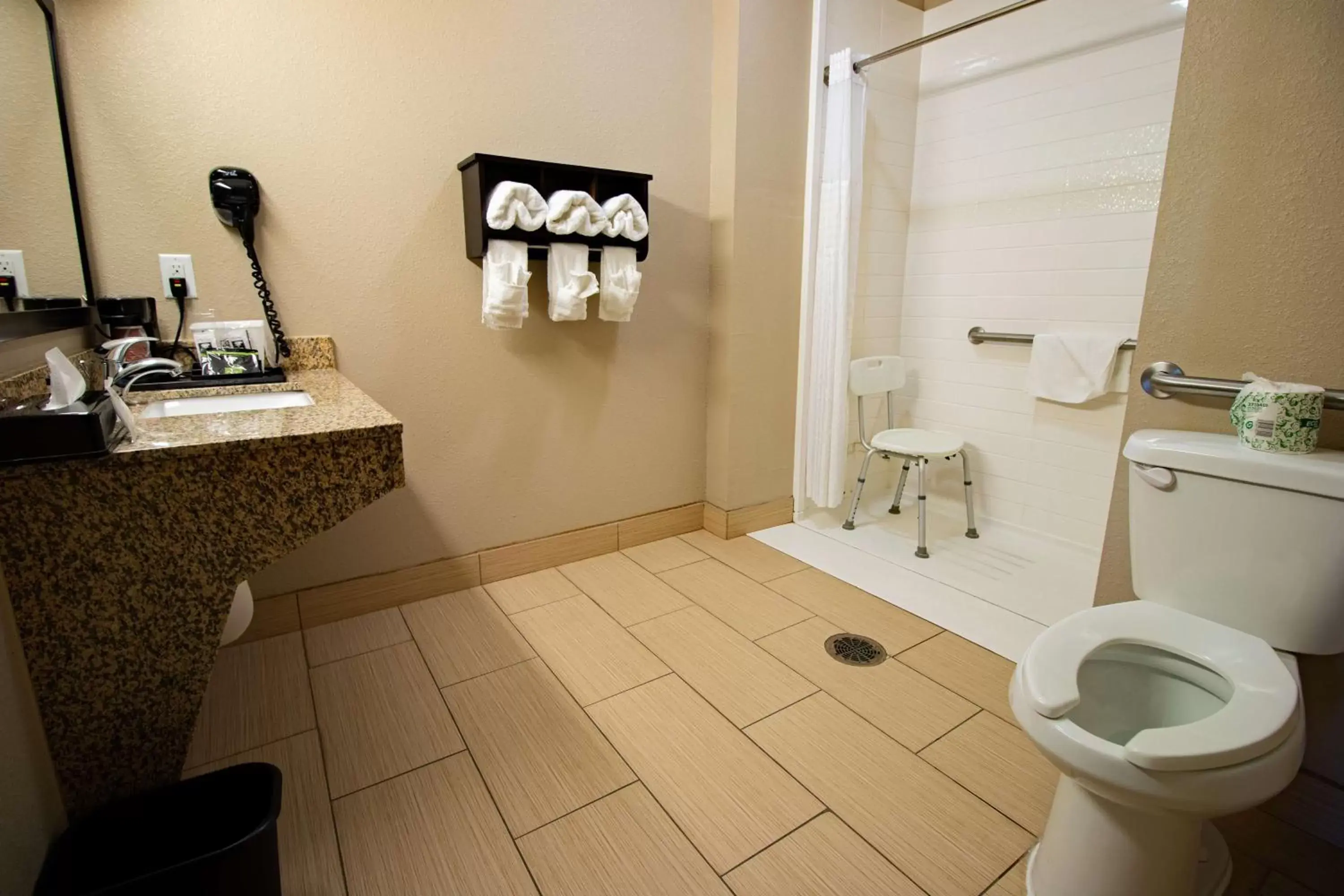 Bathroom in SureStay Plus Hotel by Best Western Owasso Tulsa North