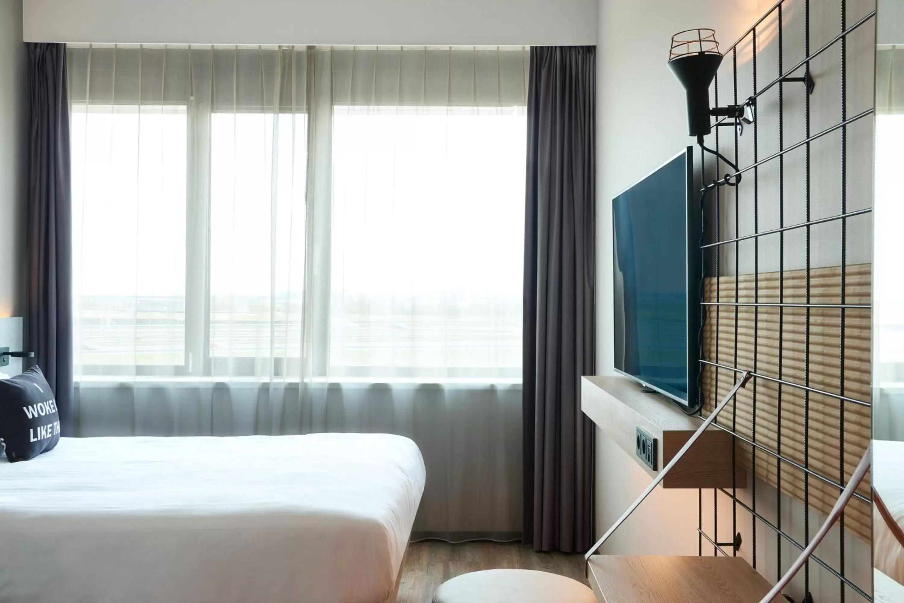 Photo of the whole room, Bed in Moxy Amsterdam Schiphol Airport