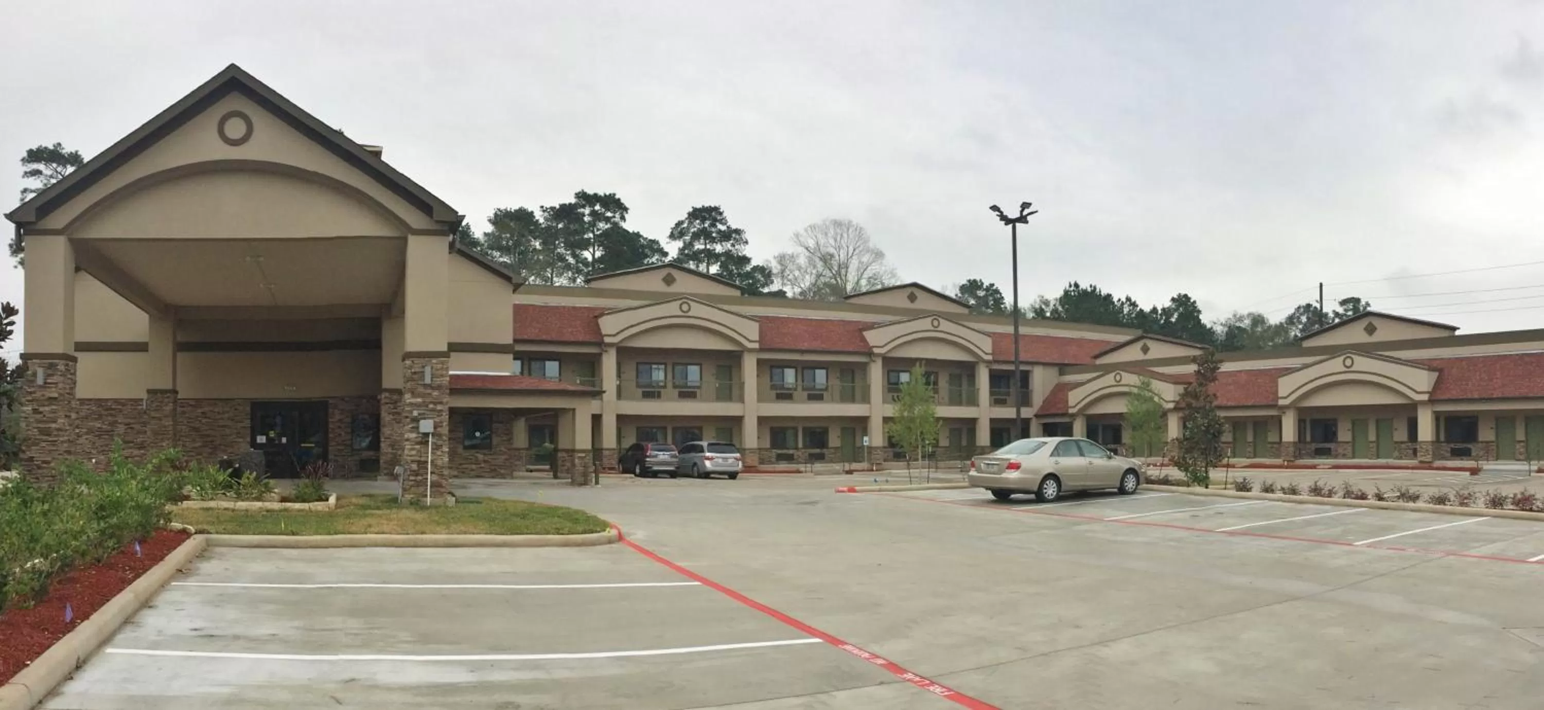 Property building in Scottish Inn & Suites - Conroe
