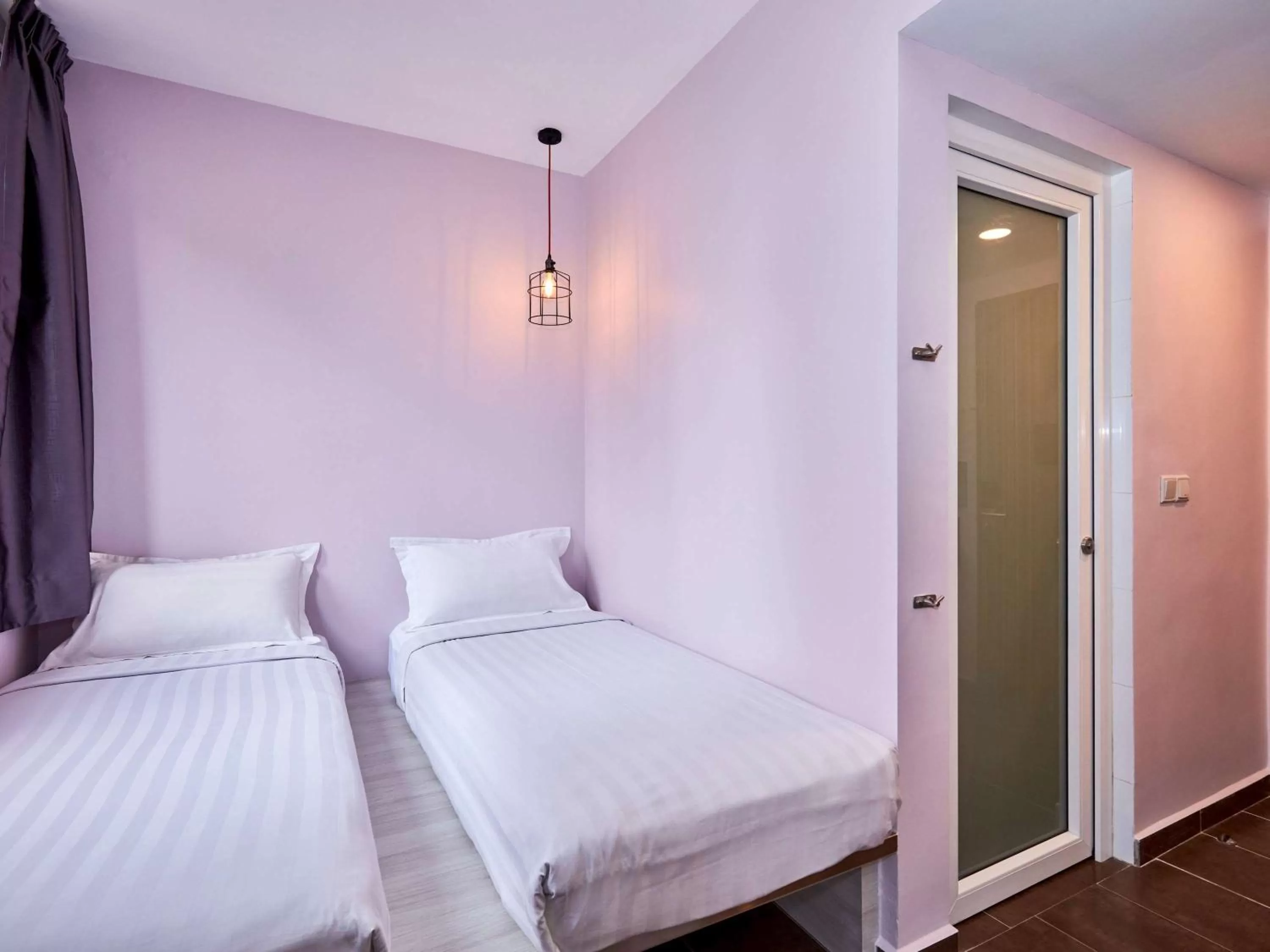 Deluxe Room with 1 Double and 2 Single Beds in ibis budget Singapore Pearl