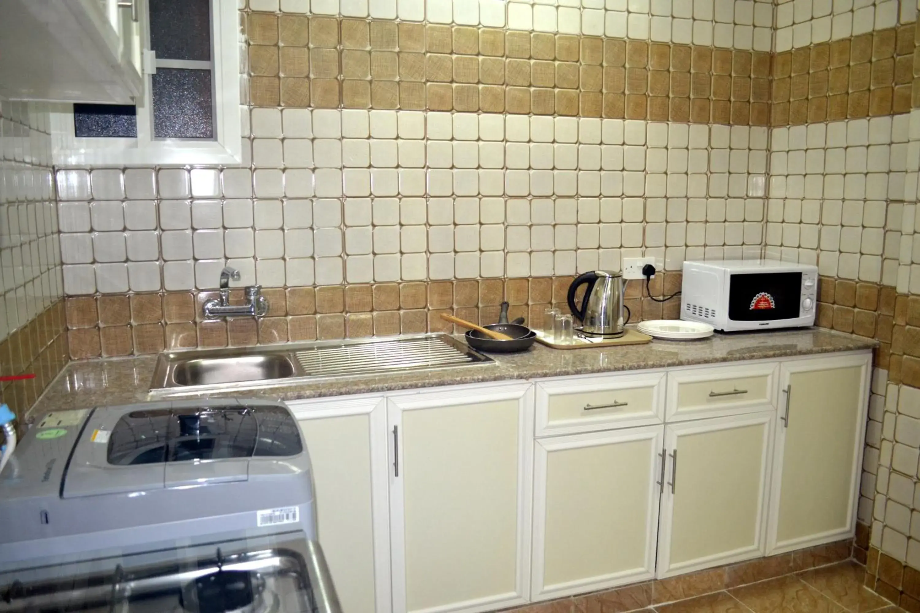 Kitchen or kitchenette, Kitchen/Kitchenette in Gateway Salalah Apartments