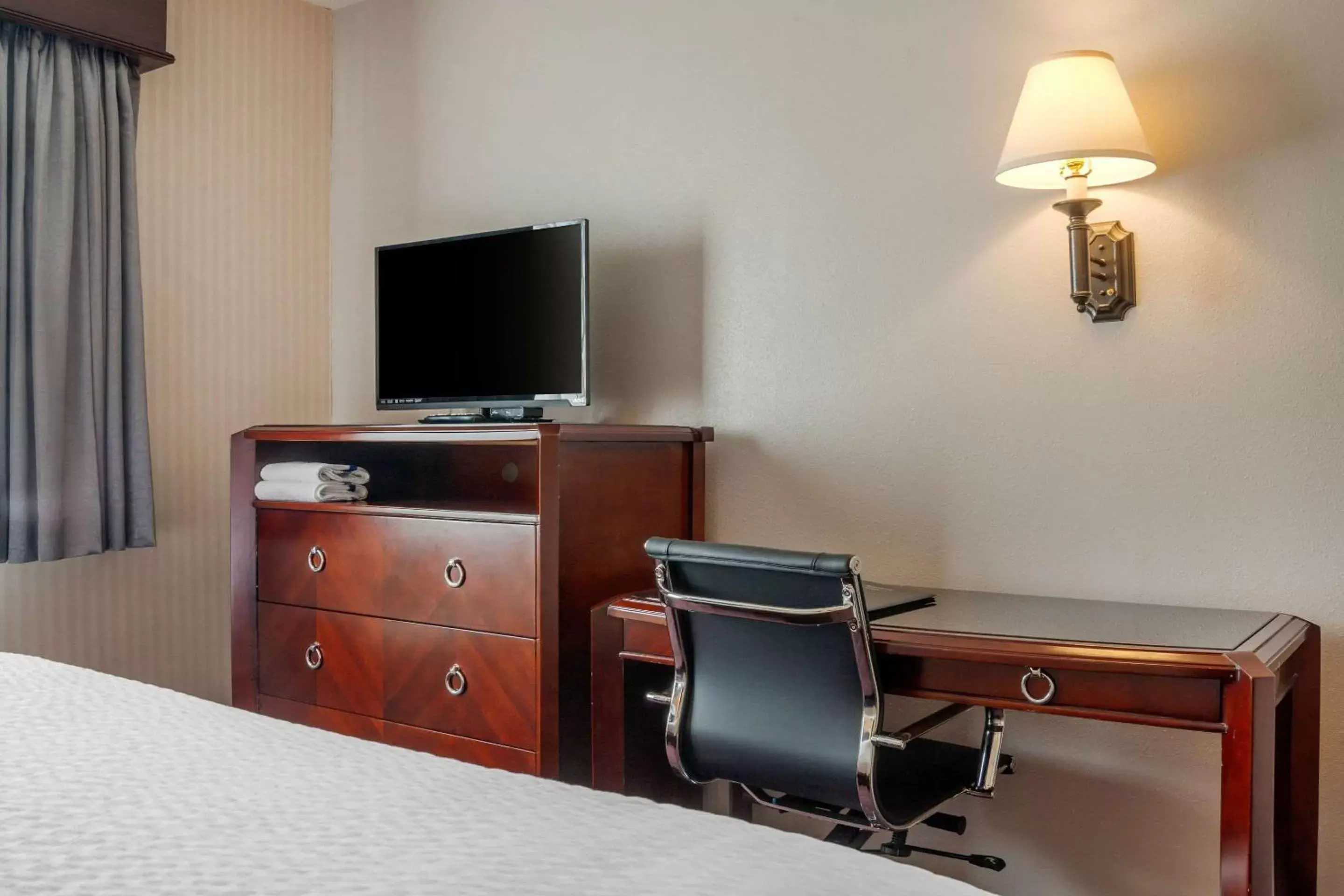 Photo of the whole room, TV/Entertainment Center in Clarion Hotel & Suites