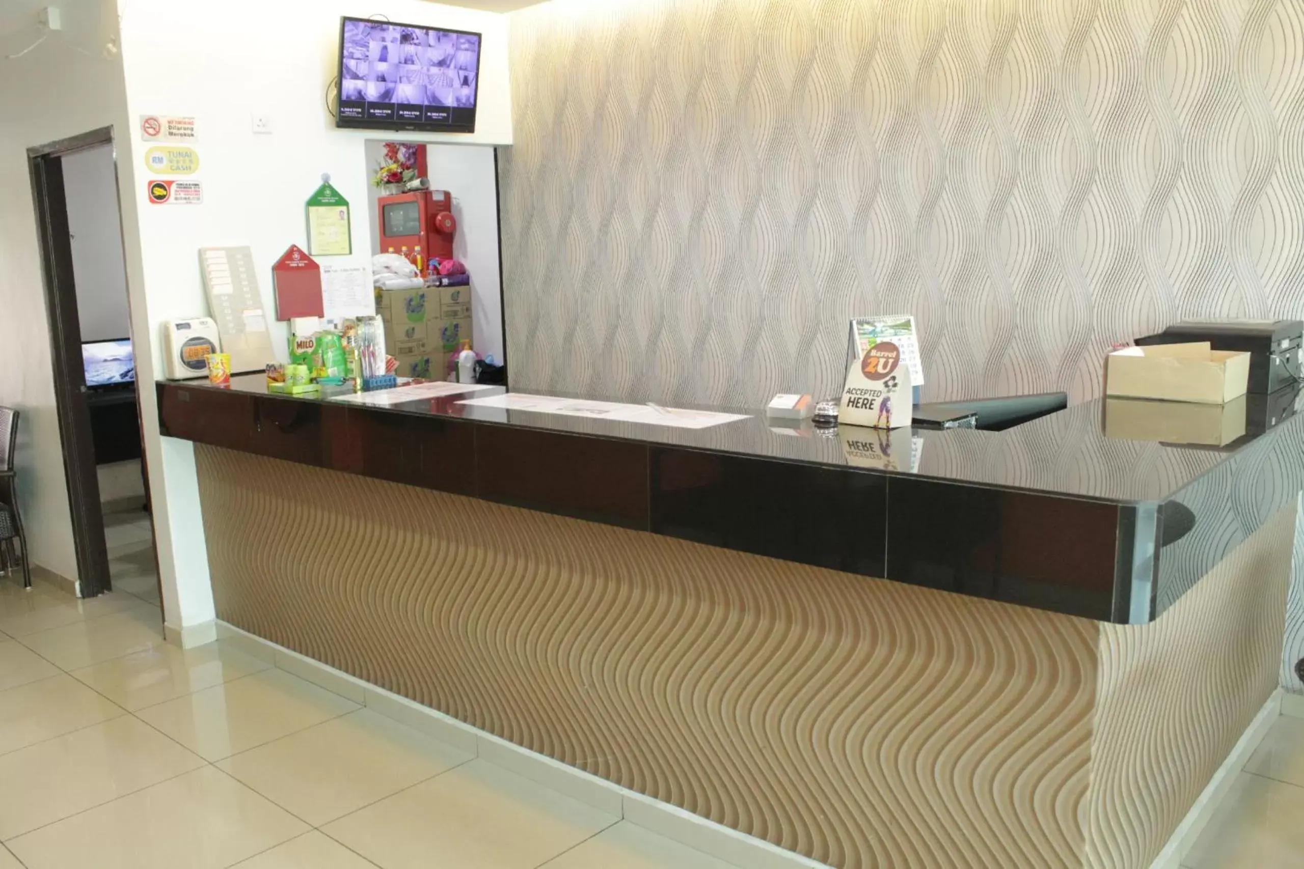 Lobby or reception in Orange Hotel Segamat Lobby or reception in Orange Hotel Segamat