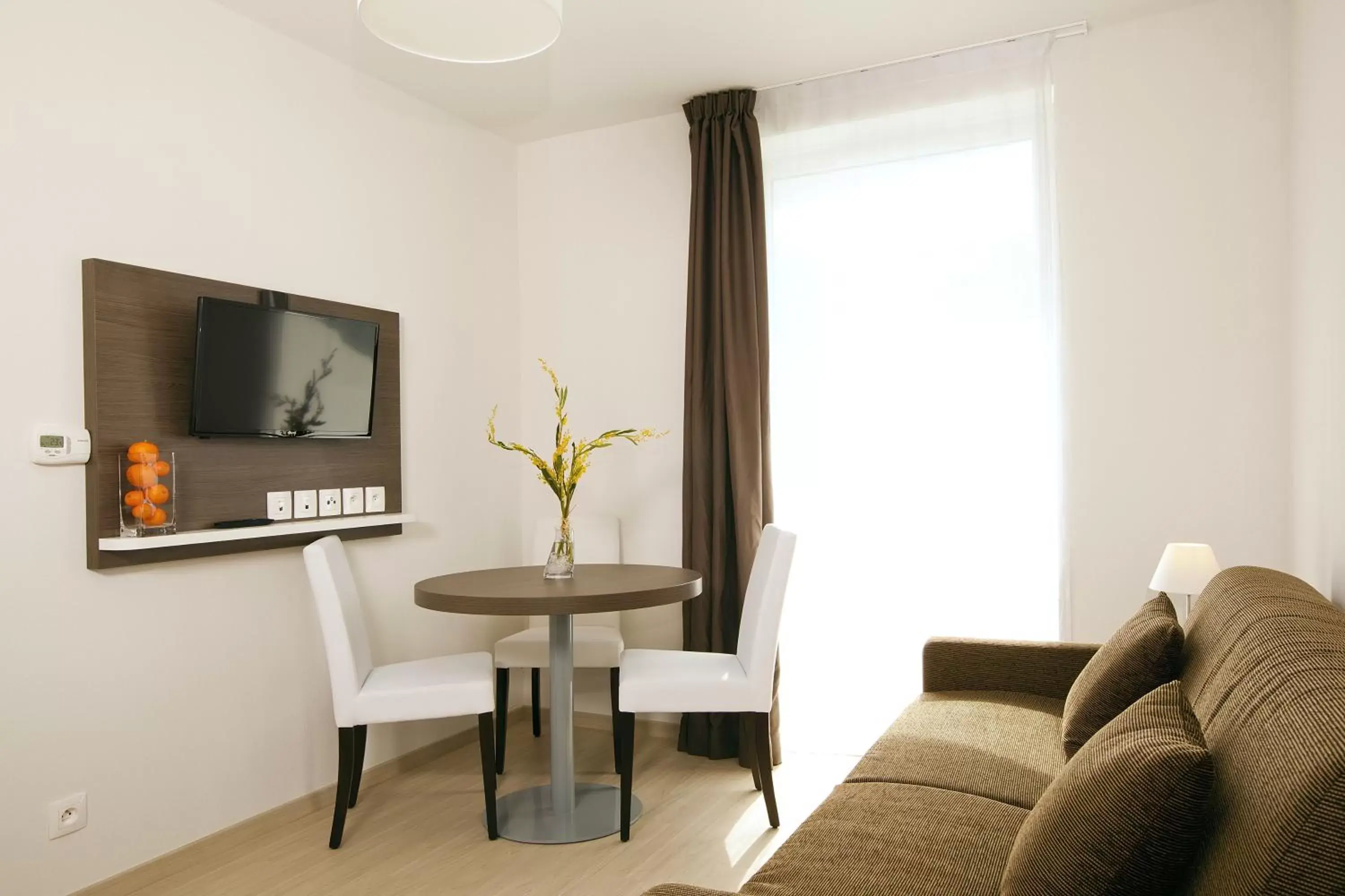 Living room in Séjours & Affaires Massy Atlantis Living room in Séjours & Affaires Massy Atlantis