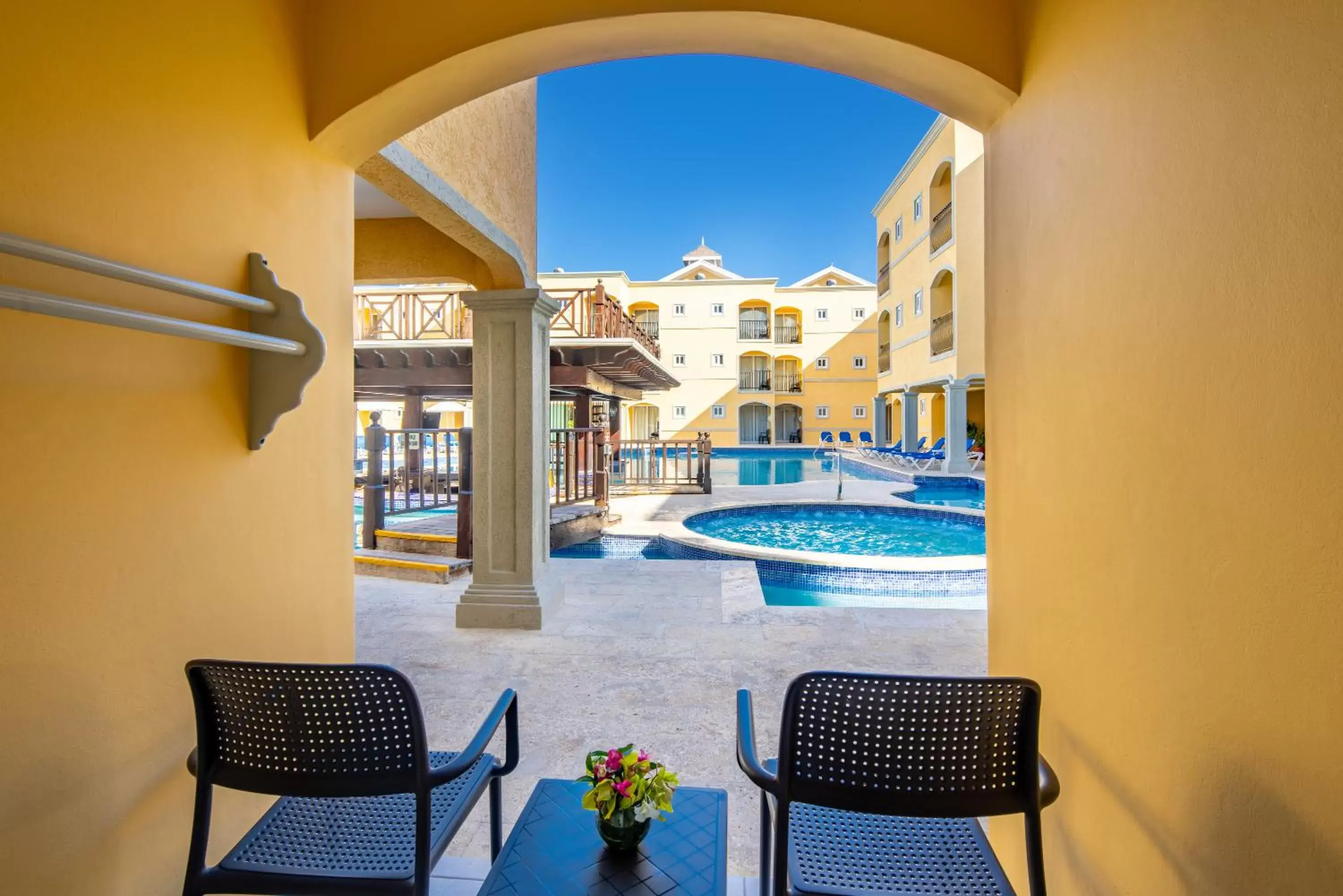 Balcony/Terrace, Swimming Pool in Jewel Paradise Cove Adult Beach Resort & Spa