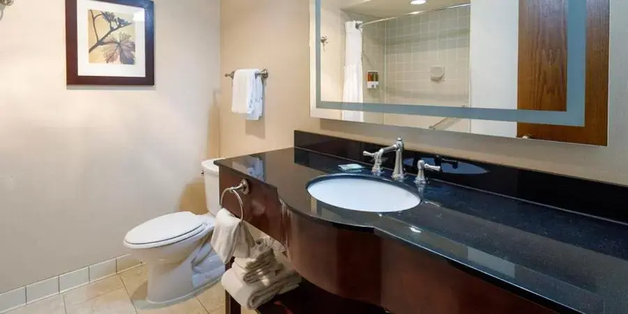 Bathroom in Maverick Hotel and Casino by Red Lion Hotels Bathroom in Maverick Hotel and Casino by Red Lion Hotels