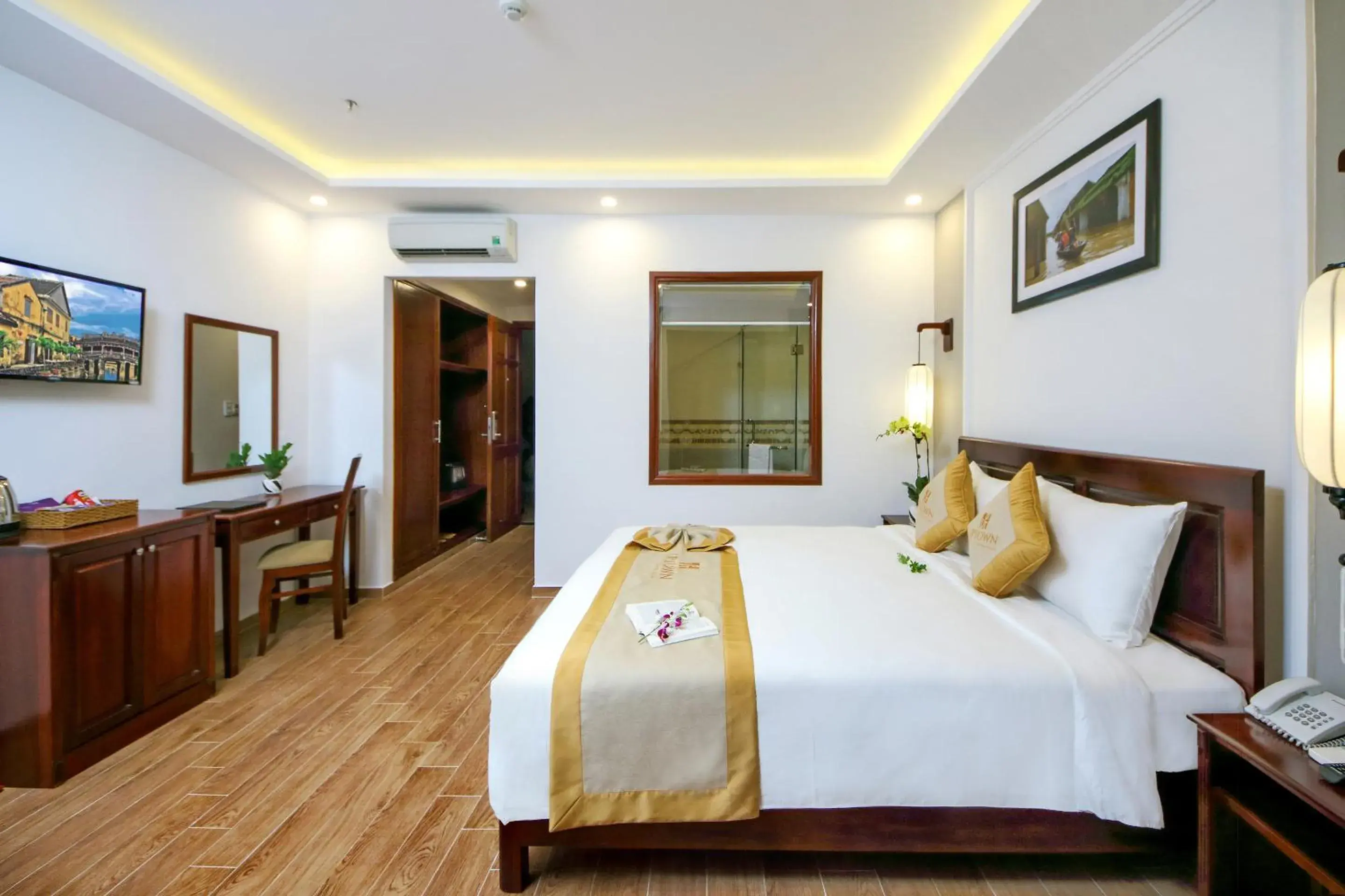 Photo of the whole room, Bed in Uptown Hoi An Hotel & Spa Photo of the whole room, Bed in Uptown Hoi An Hotel & Spa