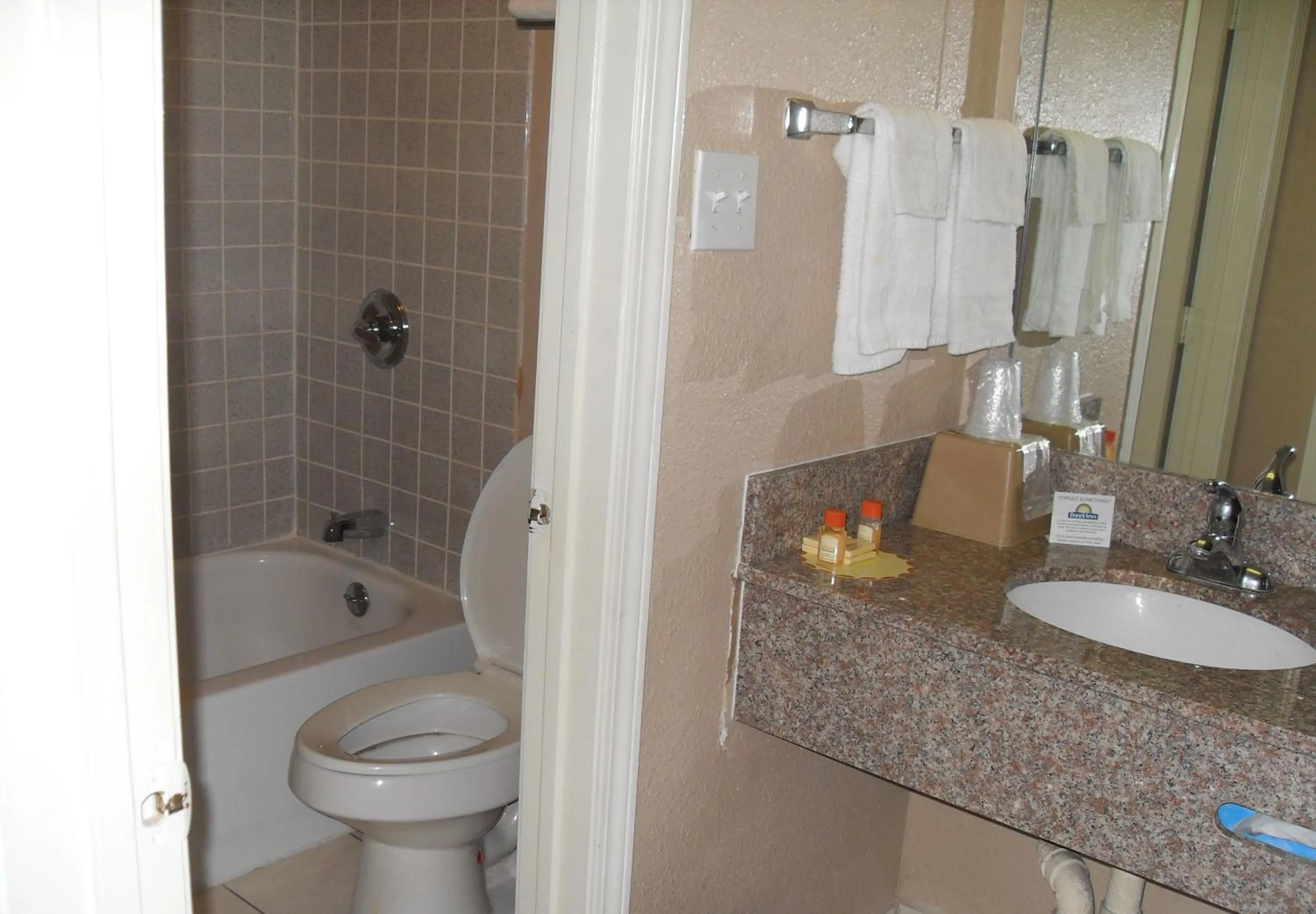 Bathroom in Days Inn by Wyndham San Antonio Splashtown/ATT Center