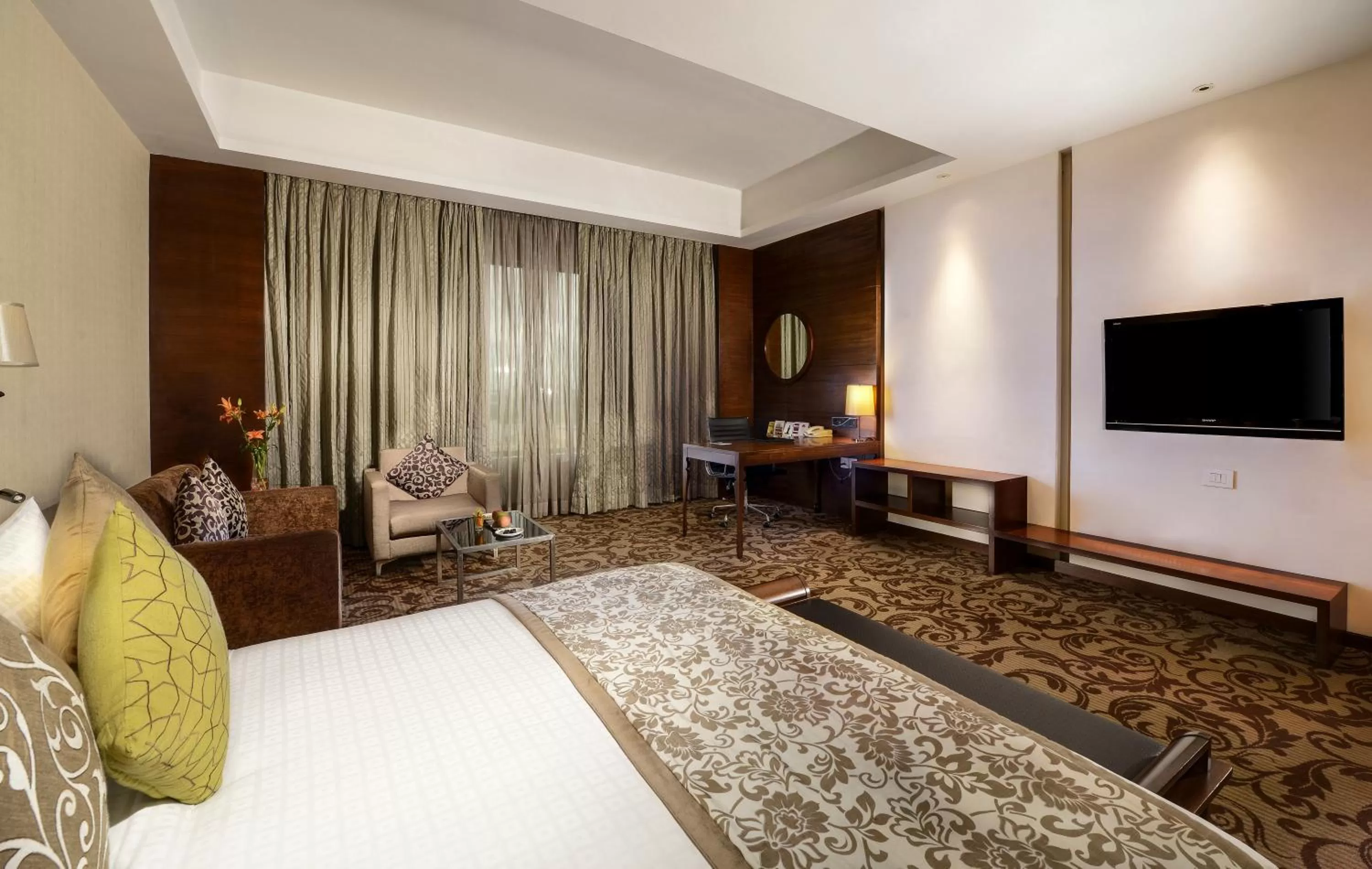 Bed in Pride Plaza Hotel, Kolkata