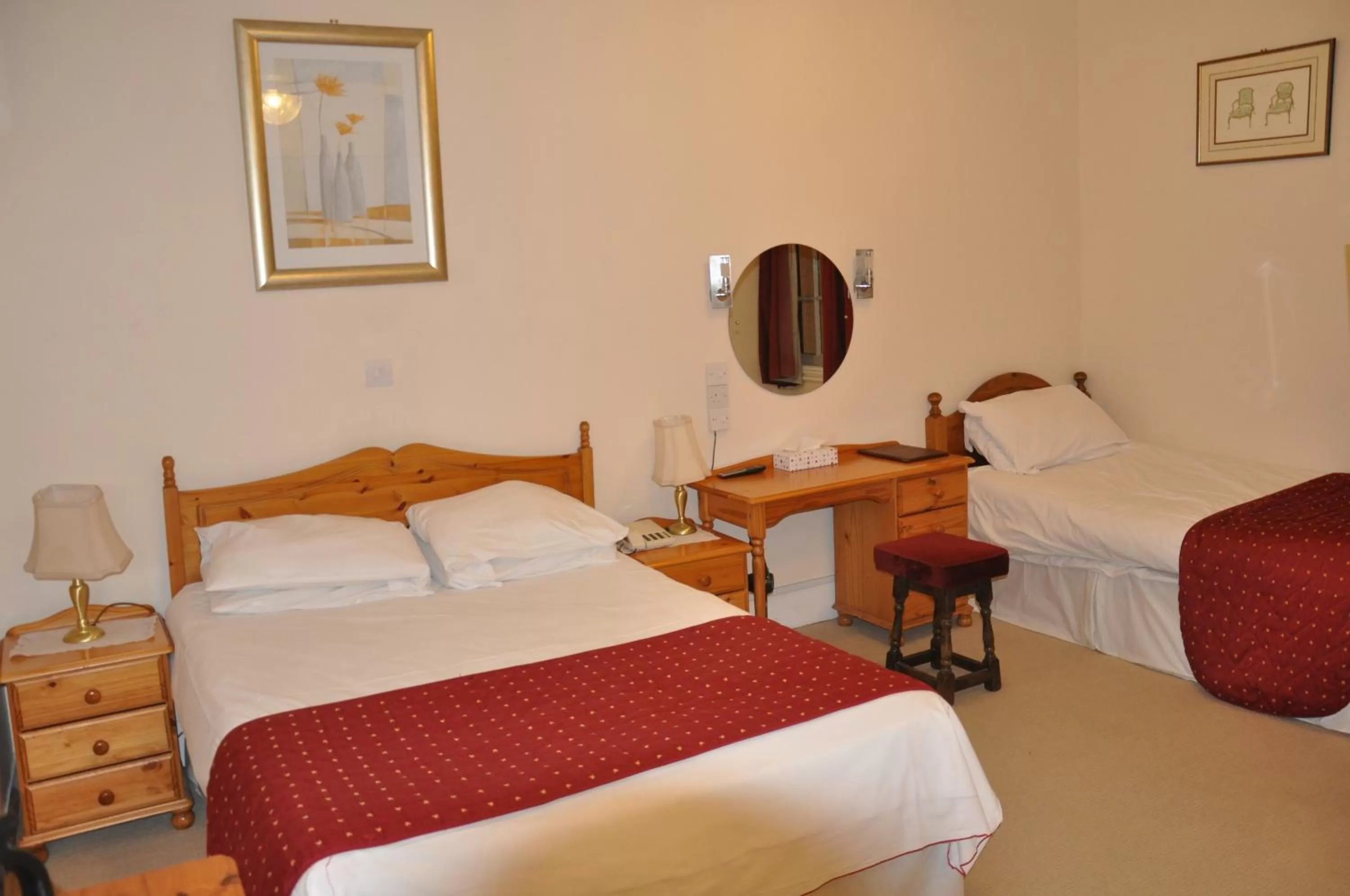 Bed in The Roundabout Hotel