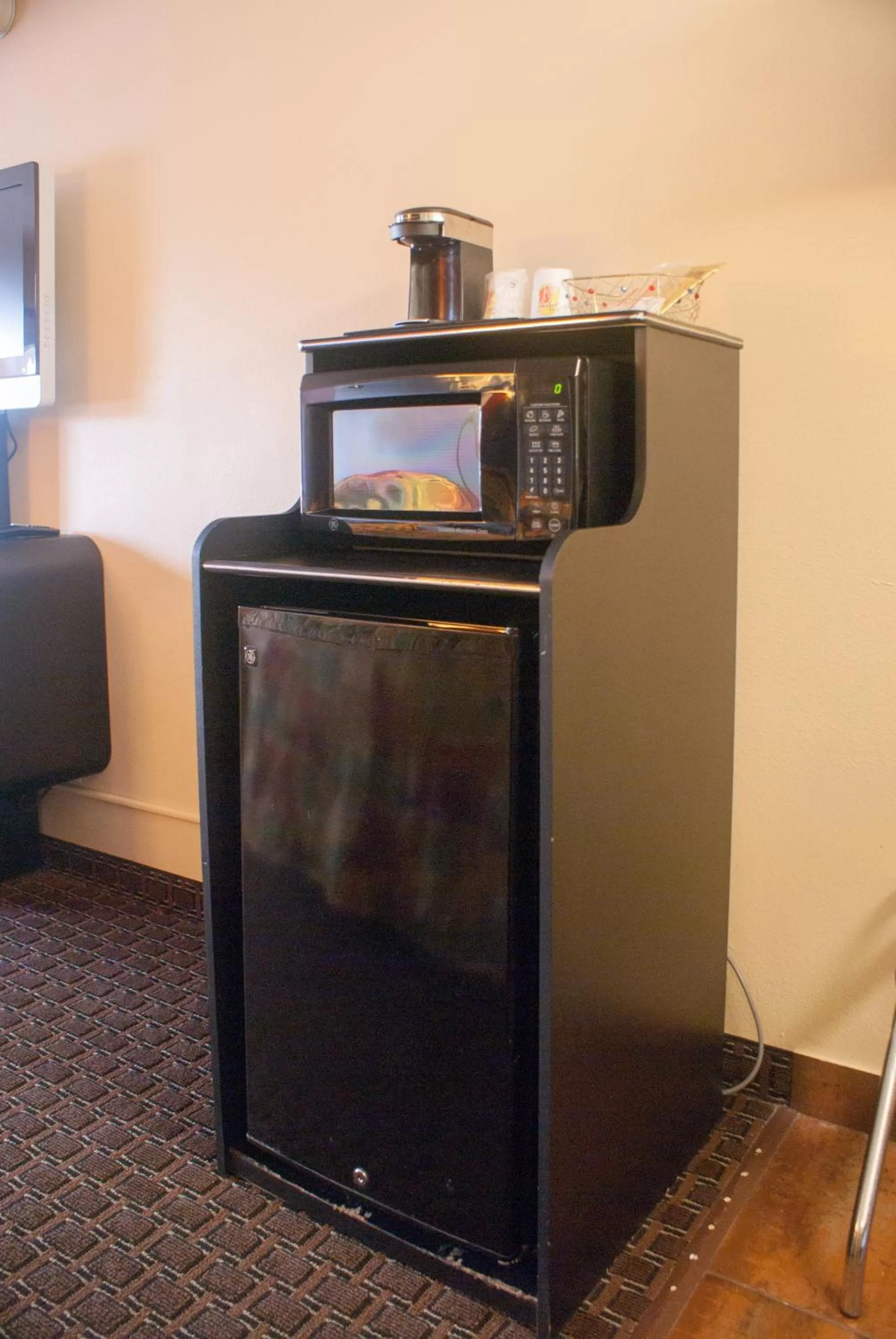 Queen Room with Two Queen Beds and Pool View - Non-Smoking in Super 8 by Wyndham Kissimmee/Maingate/Orlando Area