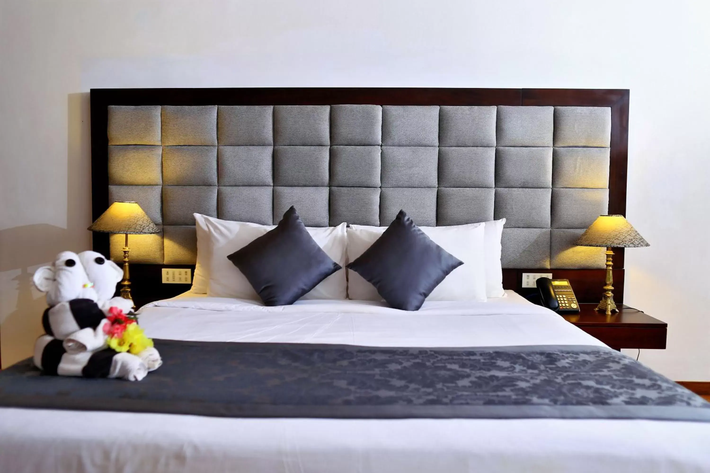 Bed in Amaranthe Bay Resort & Spa Bed in Amaranthe Bay Resort & Spa