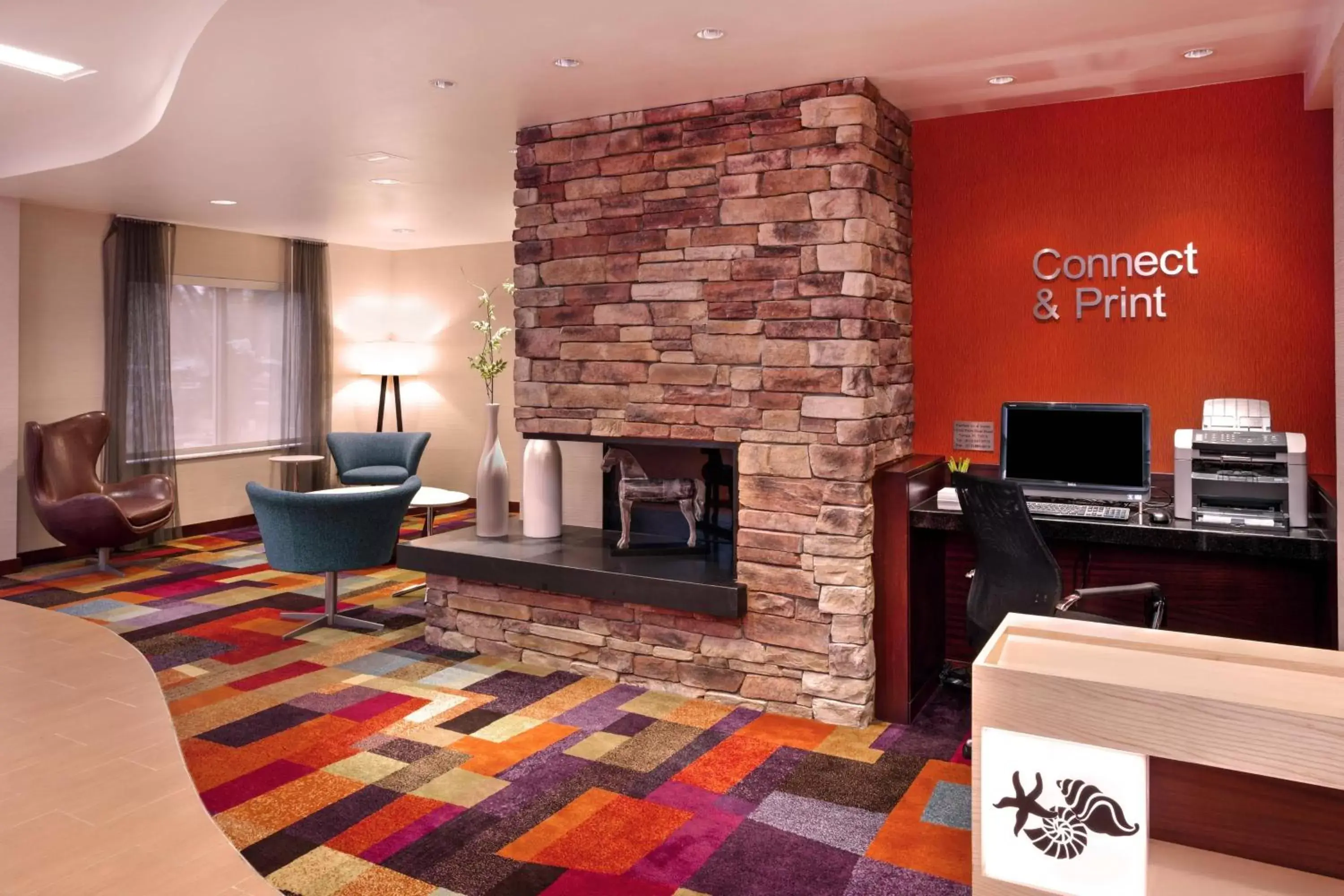 Lobby or reception, TV/Entertainment Center in Fairfield Inn and Suites by Marriott Tampa Brandon