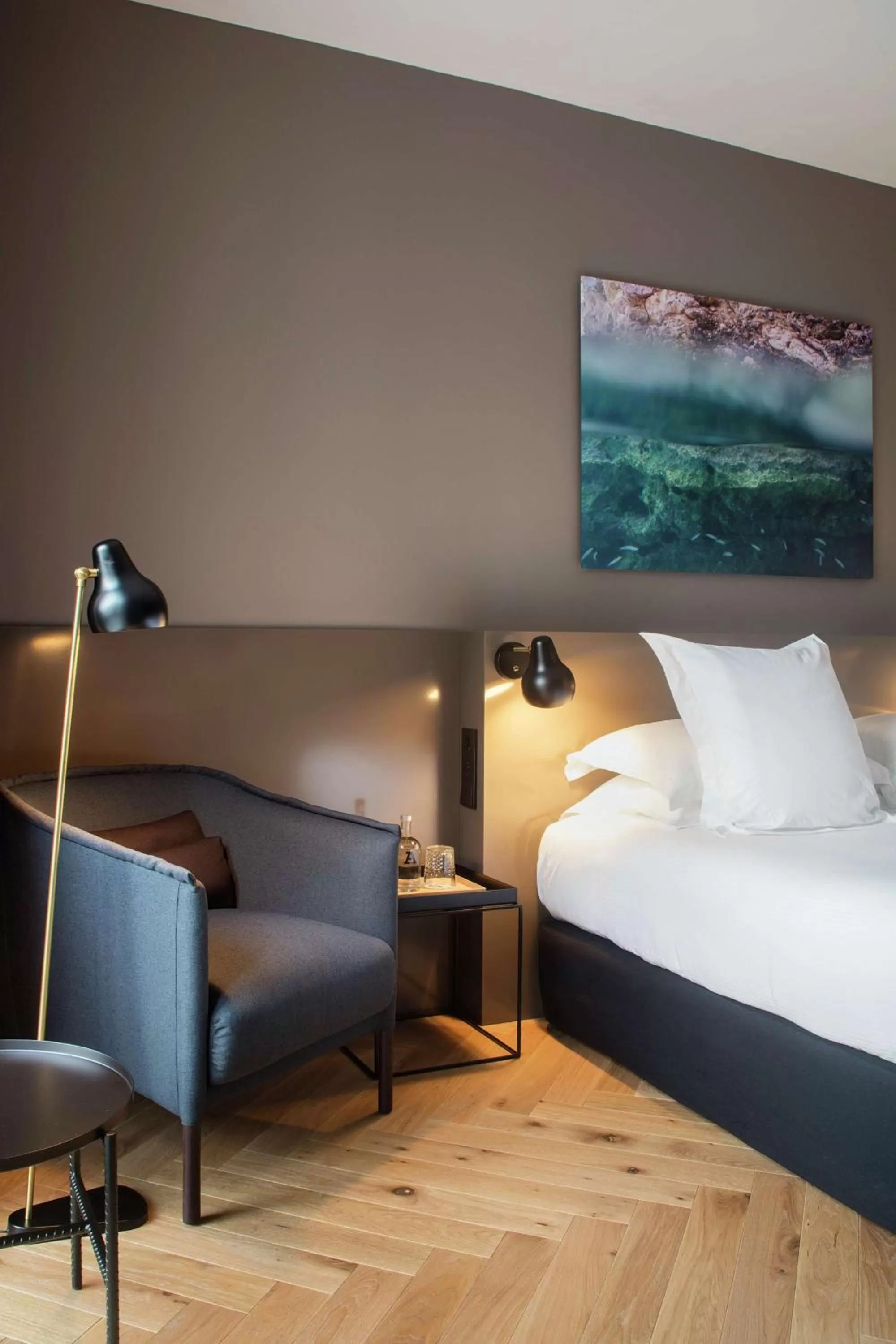 Living room, Bed in Alexandra Barcelona Hotel, Curio Collection by Hilton