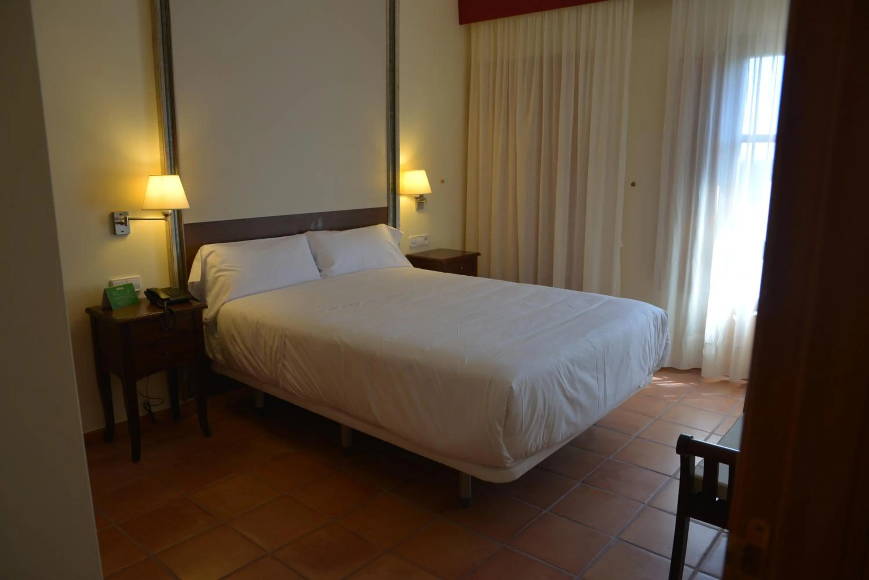 Photo of the whole room, Bed in Jardines de La Santa