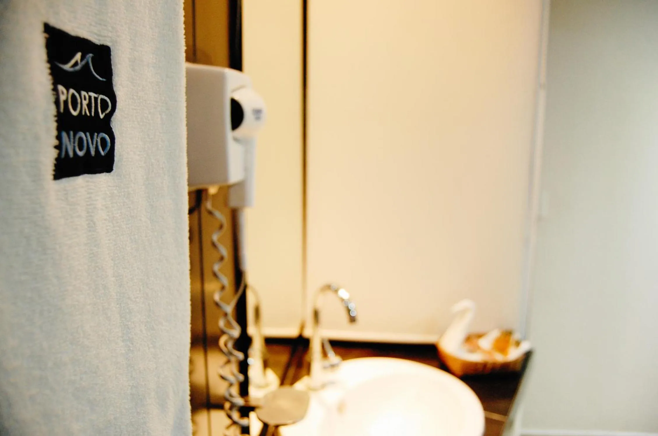 Property logo or sign in Hotel Porto Novo