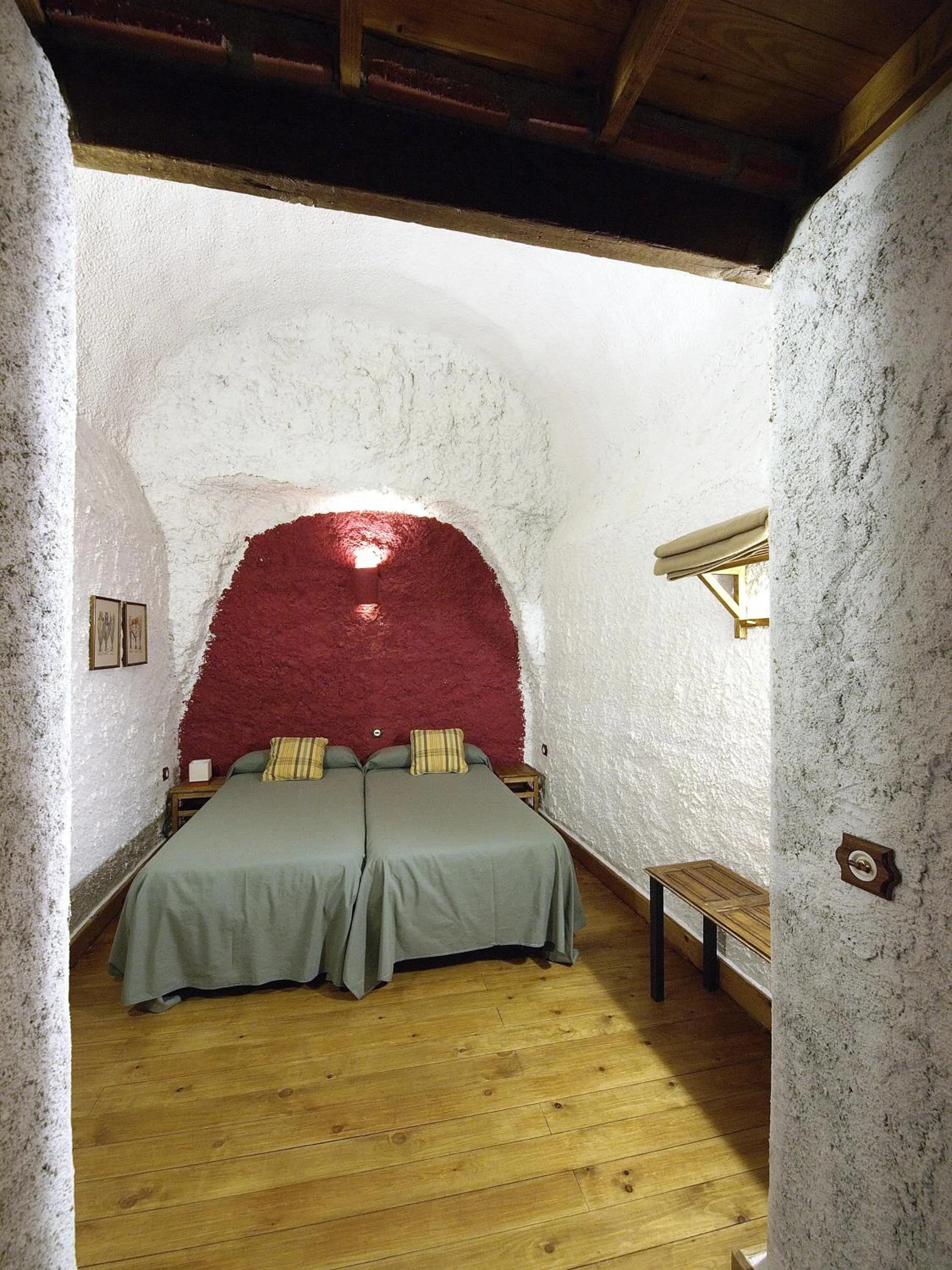 Bedroom, Bed in Casas Cueva y Cortijo La Tala en Guadix