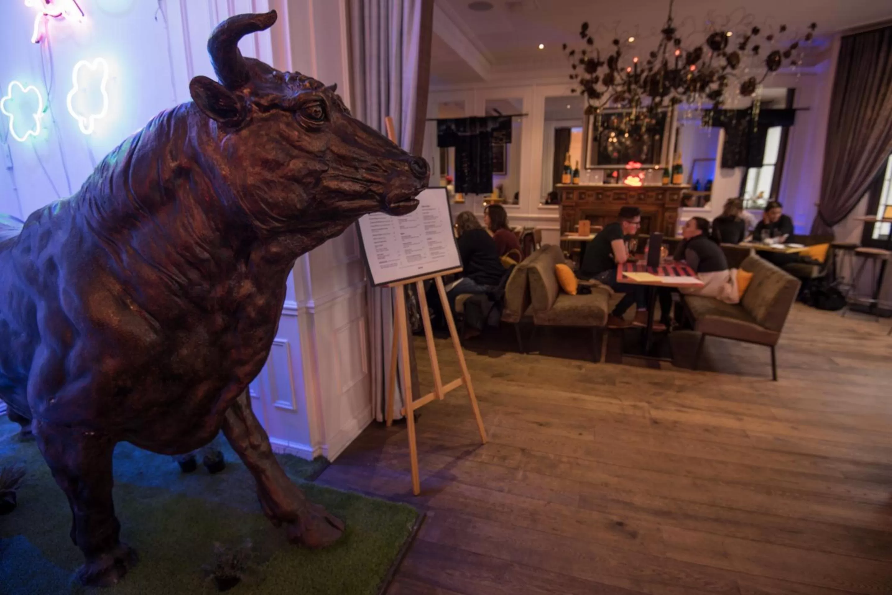 Communal lounge/ TV room in The Exhibitionist Hotel