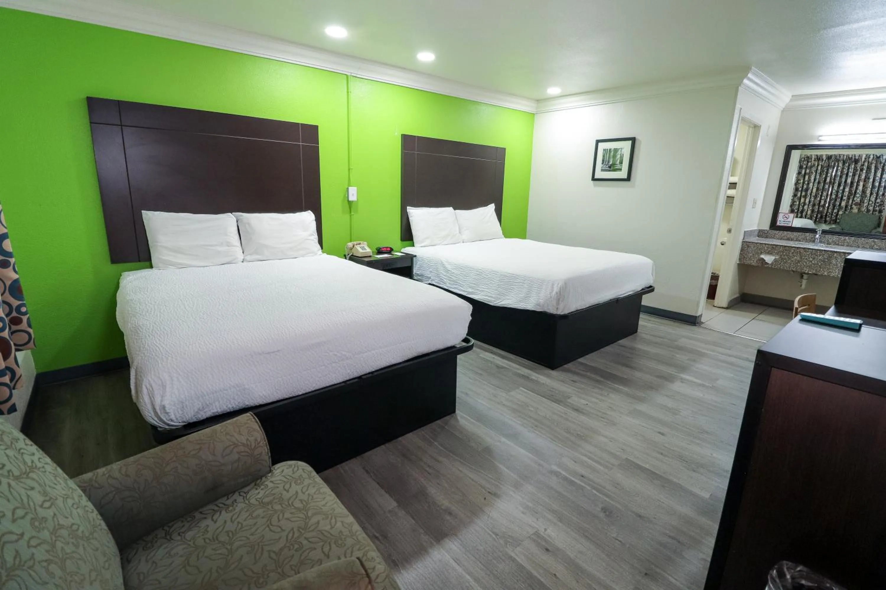 Bed in Rodeway Inn San Antonio Lackland AFB - SeaWorld