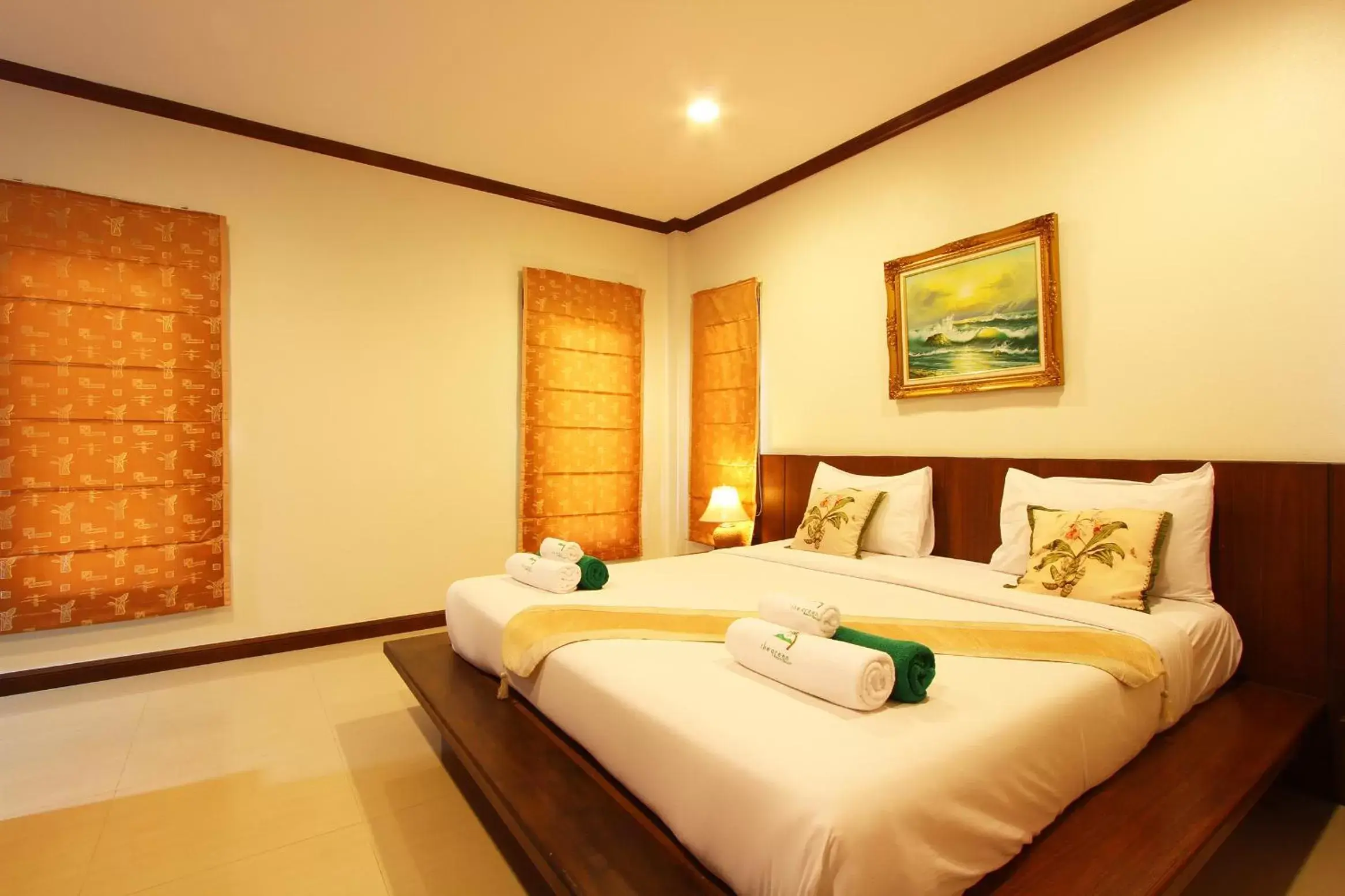 Bed in The Green Beach Resort