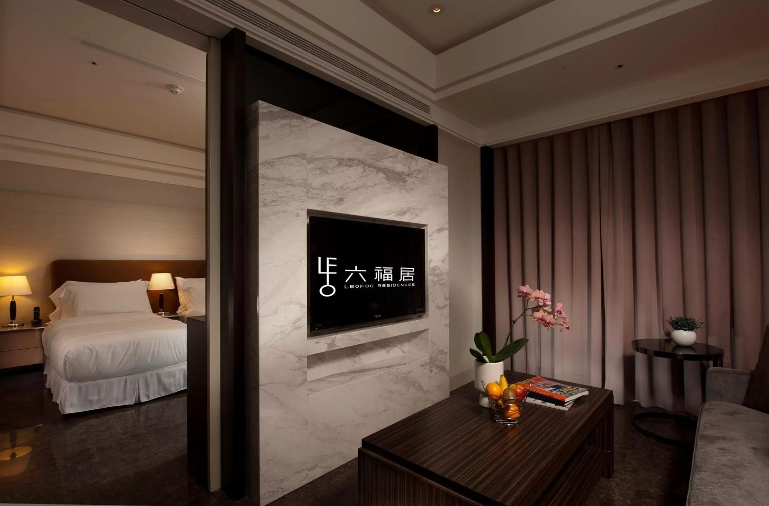 Living room, Bed in Leofoo Residences