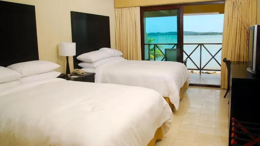 Bed in Playa Tortuga Hotel and Beach Resort