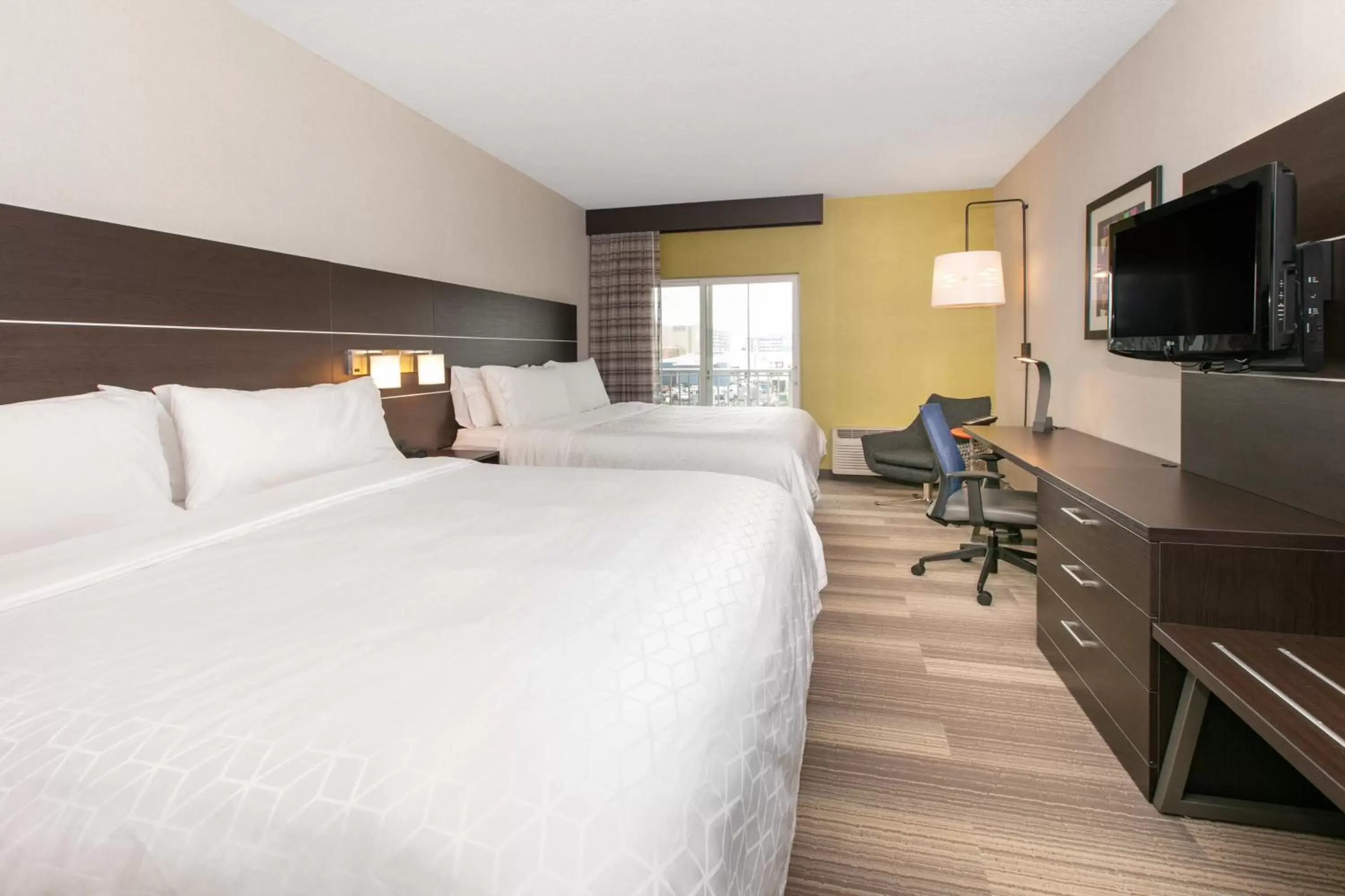 Photo of the whole room, Bed in Holiday Inn Express Hotel & Suites Seaside Convention Center, an IHG Hotel