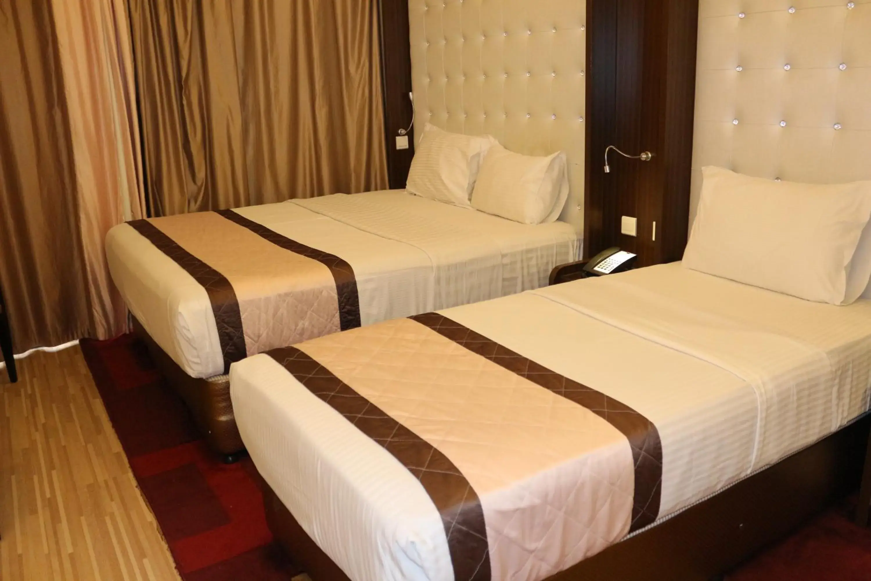 Bed in Al Khaleej Grand Hotel