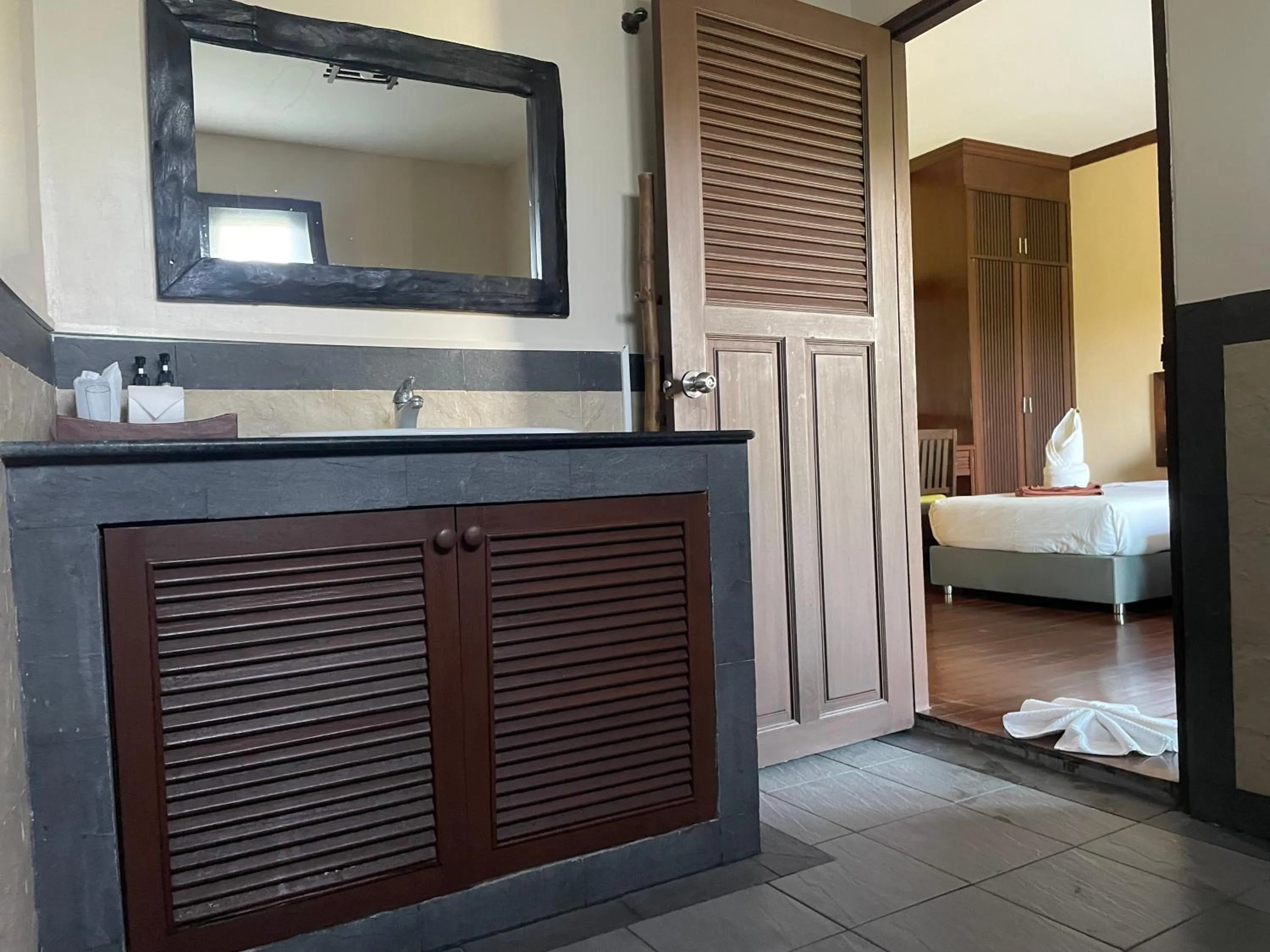 Bathroom, Bed in Grand Manita Beach Resort