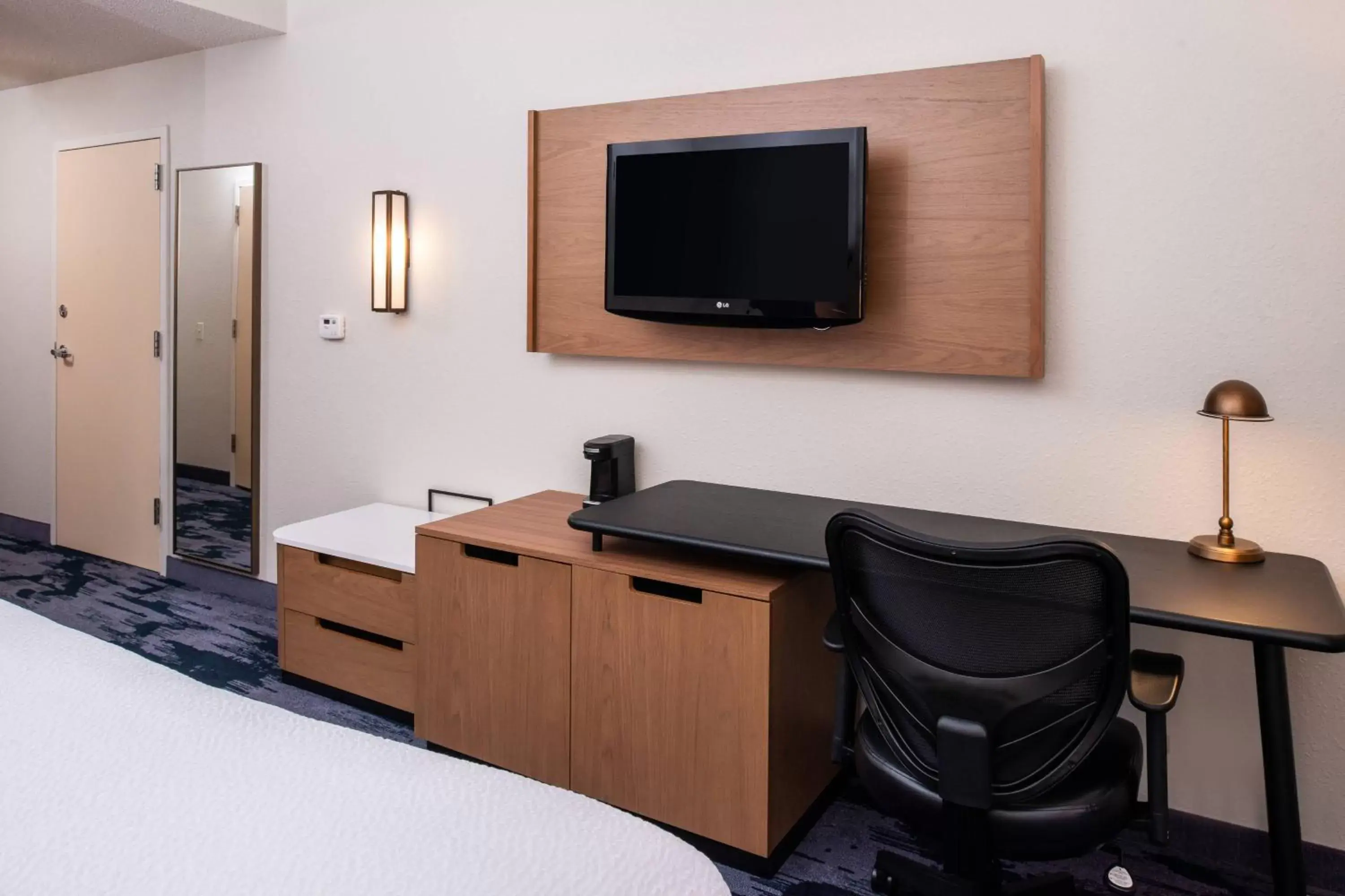 Photo of the whole room, TV/Entertainment Center in Fairfield Inn & Suites High Point Archdale